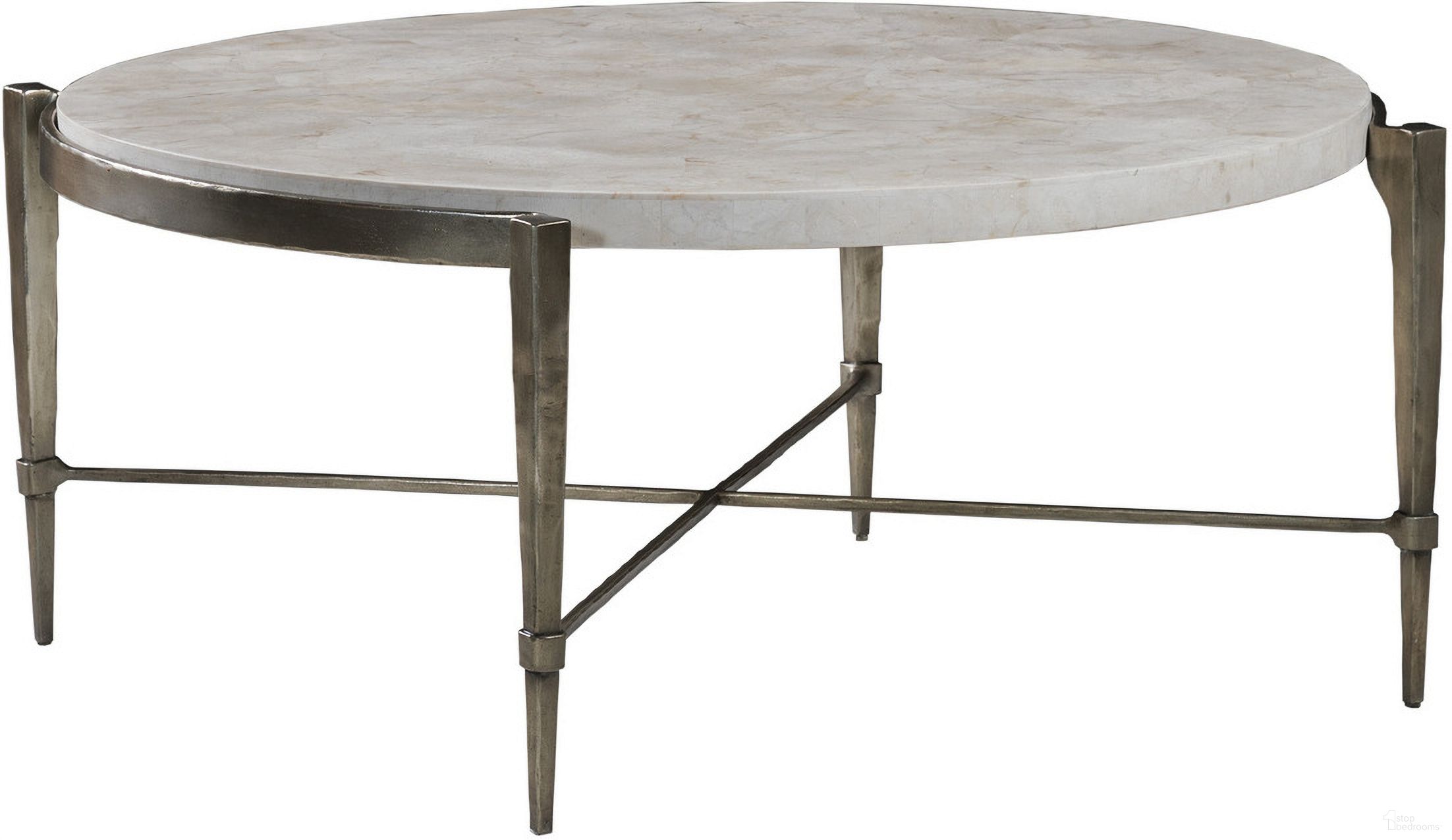 The appearance of Signature Designs Percival Cocktail Table In Champagne designed by Artistica Home in the transitional interior design. This champagne piece of furniture was selected by 1StopBedrooms from Signature Designs Collection to add a touch of cosiness and style into your home. Sku: 2319-943. Material: Metal.