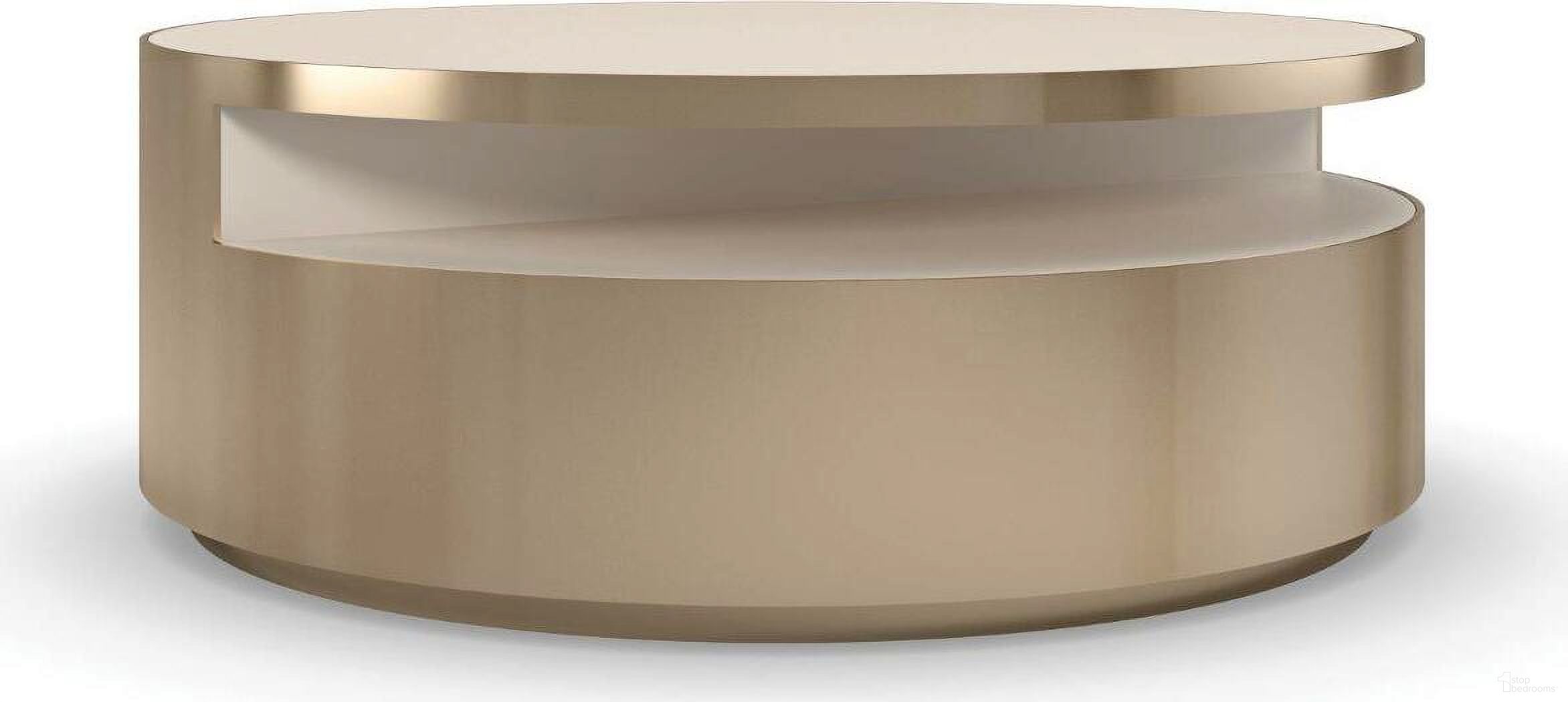 The appearance of Caracole Signature Metropolitan Turn Style Cocktail Table designed by Caracole in the transitional interior design. This gold piece of furniture  was selected by 1StopBedrooms from Signature Metropolitan Collection to add a touch of cosiness and style into your home. Sku: SIG-021-401. Material: Metal.