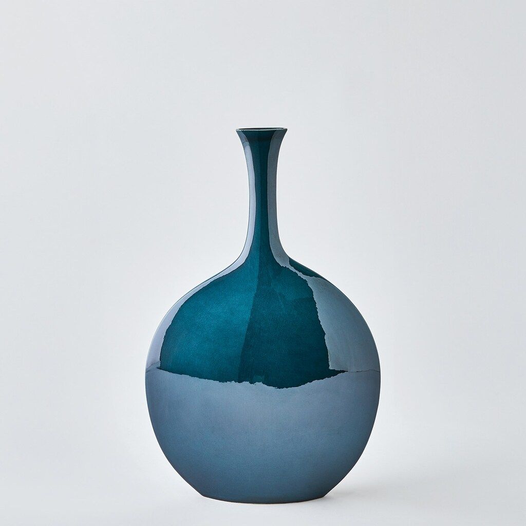 The appearance of Silhouette Round Vase In Blue designed by Global Views in the modern / contemporary interior design. This blue piece of furniture  was selected by 1StopBedrooms from Silhouette Collection to add a touch of cosiness and style into your home. Sku: 111067. Material: Marble.