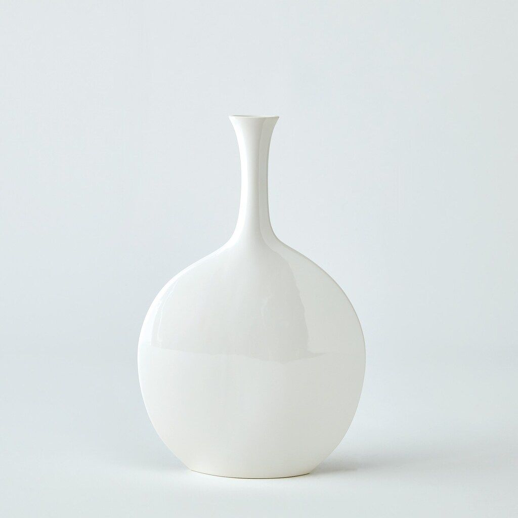 The appearance of Silhouette Round Vase In White designed by Global Views in the modern / contemporary interior design. This white piece of furniture  was selected by 1StopBedrooms from Silhouette Collection to add a touch of cosiness and style into your home. Sku: 111064. Material: Brass.