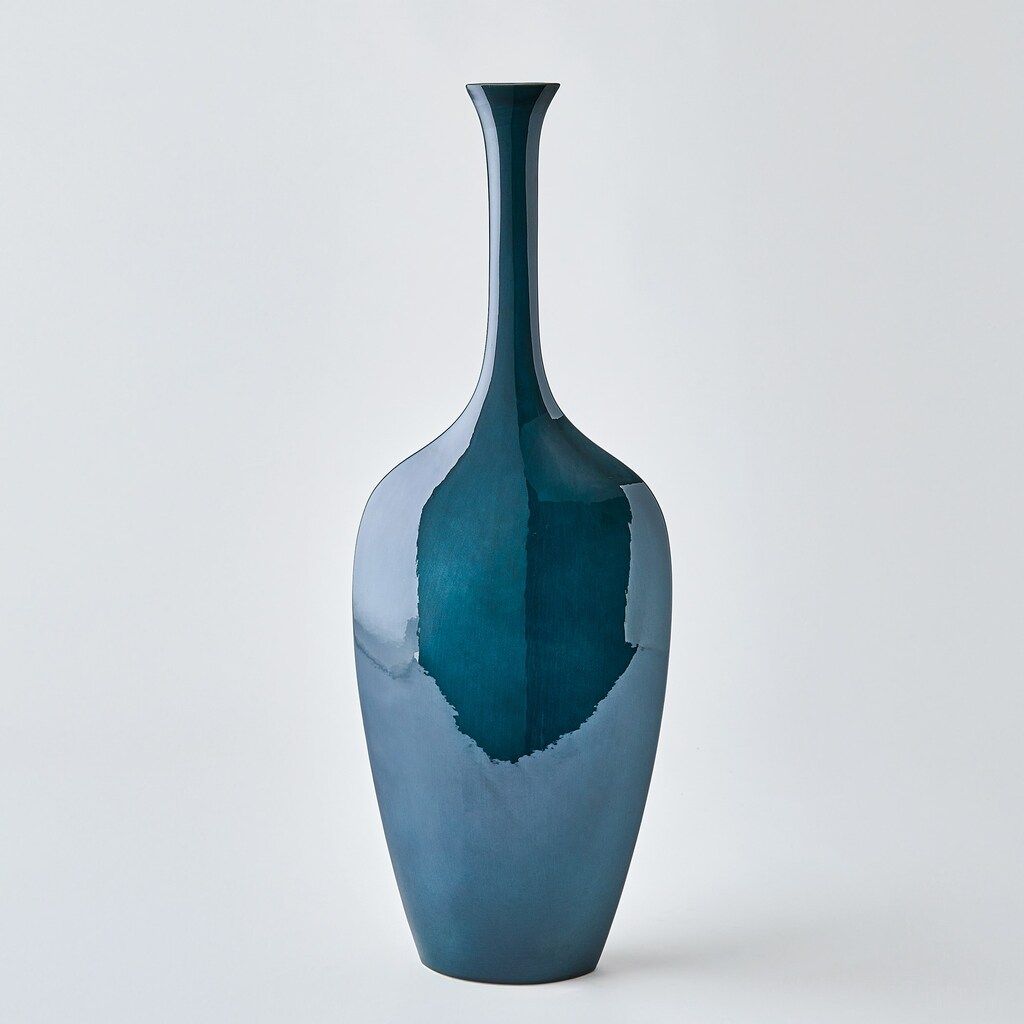 The appearance of Silhouette Slim Vase In Blue designed by Global Views in the modern / contemporary interior design. This blue piece of furniture  was selected by 1StopBedrooms from Silhouette Collection to add a touch of cosiness and style into your home. Sku: 111066. Material: Iron.