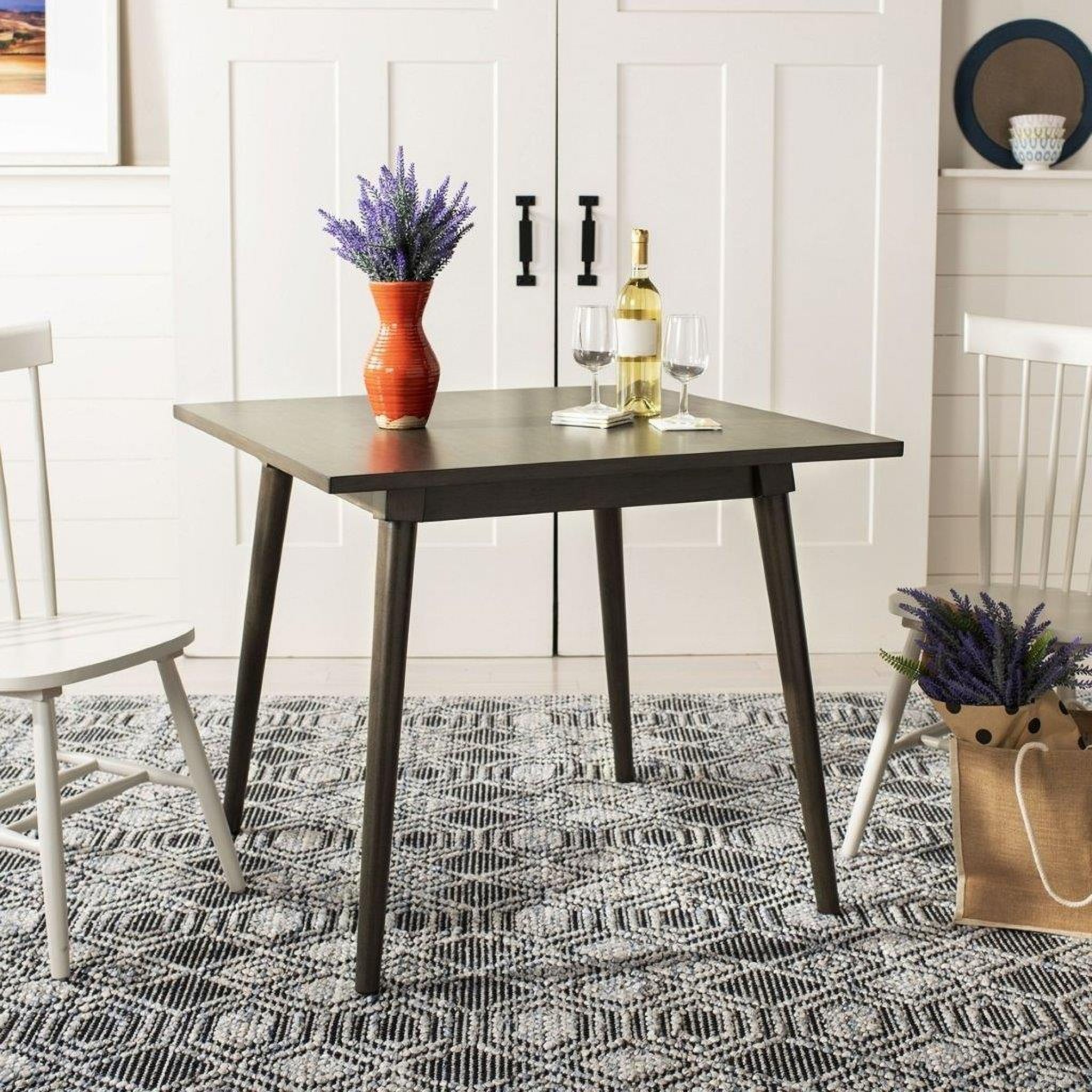 The appearance of Simone Ash Brown Square Dining Room Set designed by Safavieh in the transitional interior design. This brown piece of furniture was selected by 1StopBedrooms from Simone Collection to add a touch of cosiness and style into your home. Sku: DTB9200B;AMH8500A-SET2. Table Base Style: Legs. Table Top Shape: Square. Material: Wood. Size: 36" x 36".
