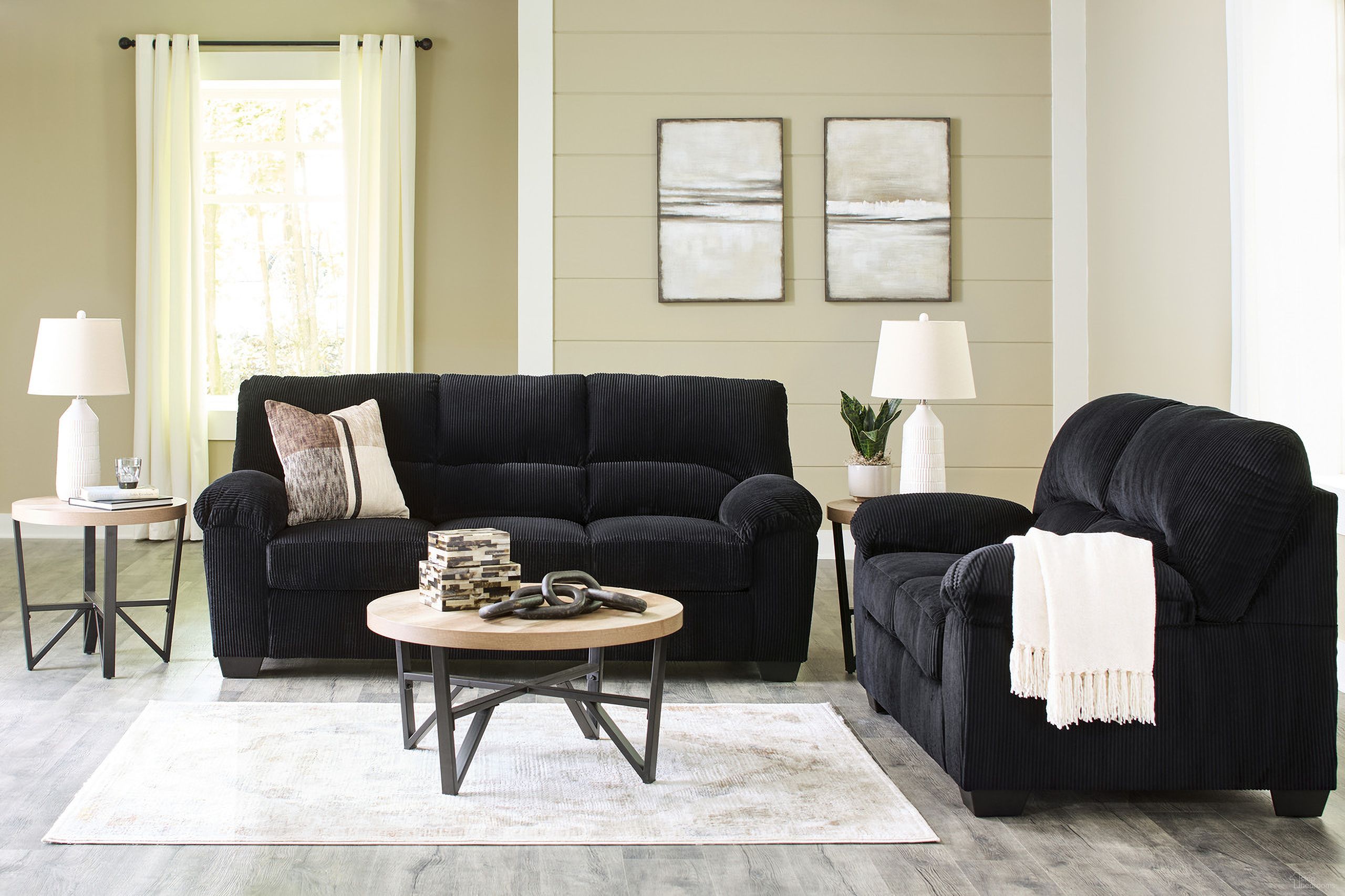 The appearance of Simplejoy Living Room Set In Onyx designed by Signature Design by Ashley in the modern / contemporary interior design. This onyx piece of furniture was selected by 1StopBedrooms from Simplejoy Collection to add a touch of cosiness and style into your home. Sku: 2420438;2420435. Material: Fabric.
