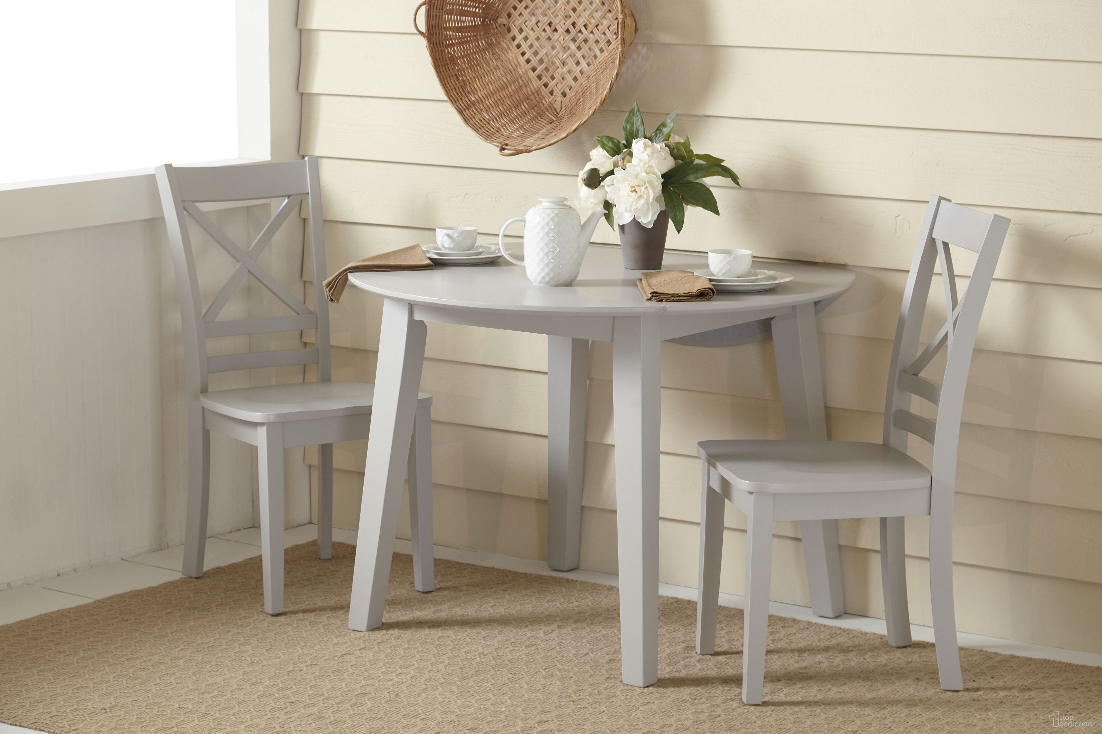 The appearance of Simplicity Dove Round Extendable Dining Room Set designed by Jofran in the transitional interior design. This gray piece of furniture was selected by 1StopBedrooms from Simplicity Collection to add a touch of cosiness and style into your home. Sku: 252-28;252-806KD. Table Base Style: Legs. Table Top Shape: Round. Material: Rubberwood. Size: 42".