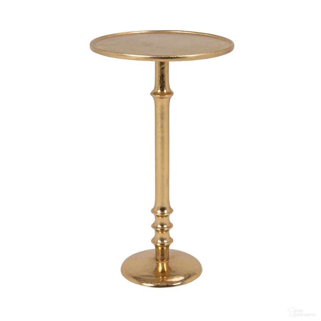 The appearance of Sinclair Round Metal Pedestal Accent Table In Gold designed by Rowena Interiors in the traditional interior design. This gold piece of furniture was selected by 1StopBedrooms from Sinclair Collection to add a touch of cosiness and style into your home. Sku: EC2259. Material: Aluminium.