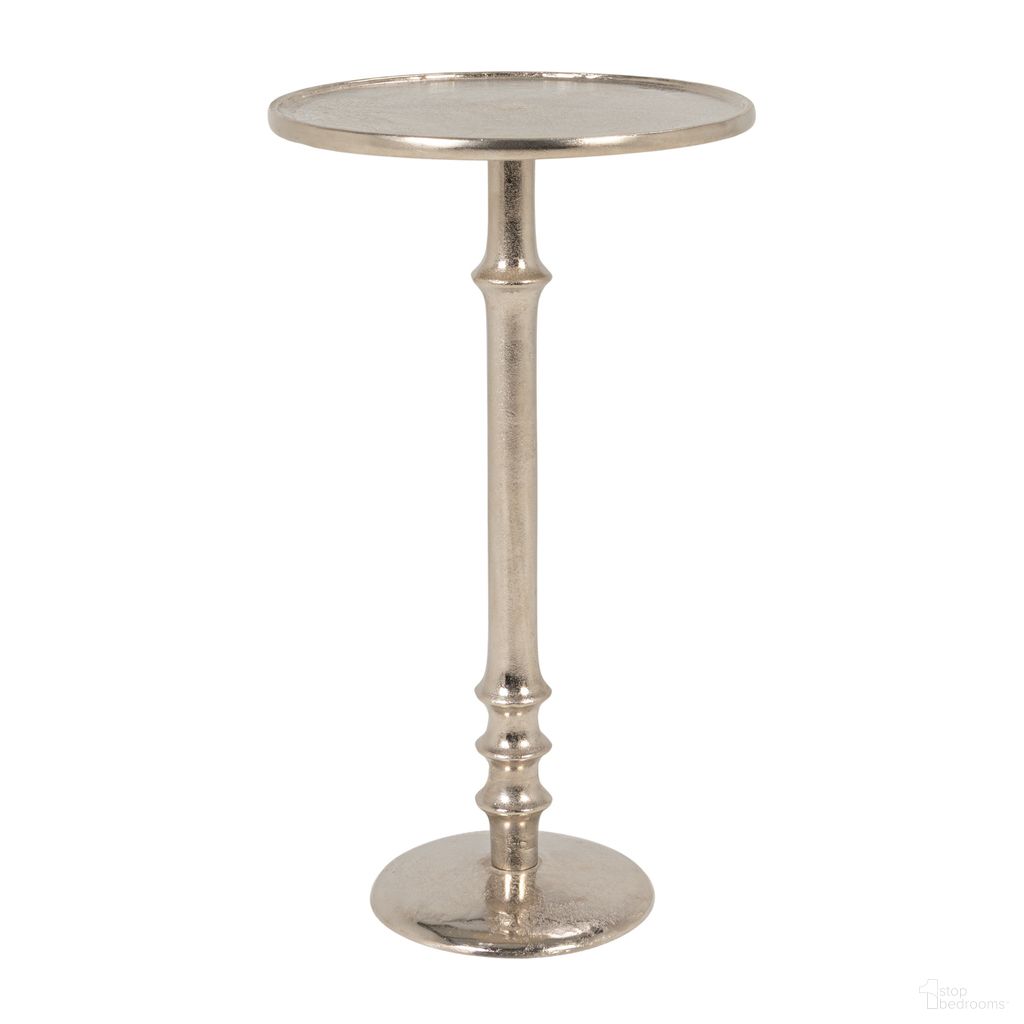 The appearance of Sinclair Round Metal Pedestal Accent Table In Silver designed by Rowena Interiors in the traditional interior design. This silver piece of furniture was selected by 1StopBedrooms from Sinclair Collection to add a touch of cosiness and style into your home. Sku: EC2260. Material: Aluminium.