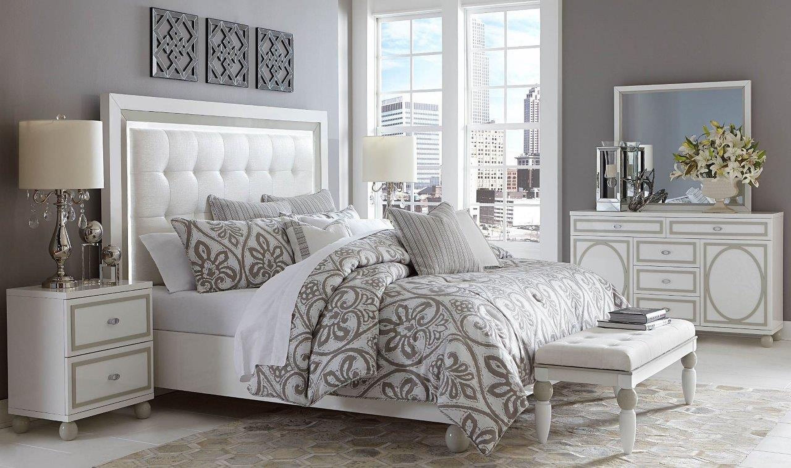 The appearance of Sky Tower Panel Bedroom Set In Cloud White designed by Michael Amini in the modern / contemporary interior design. This cloud white piece of furniture was selected by 1StopBedrooms from Sky Tower Collection to add a touch of cosiness and style into your home. Sku: N9025612-108;N9025632-108;9000238-00;N9025640-108. Material: Wood. Bed Size: California King.