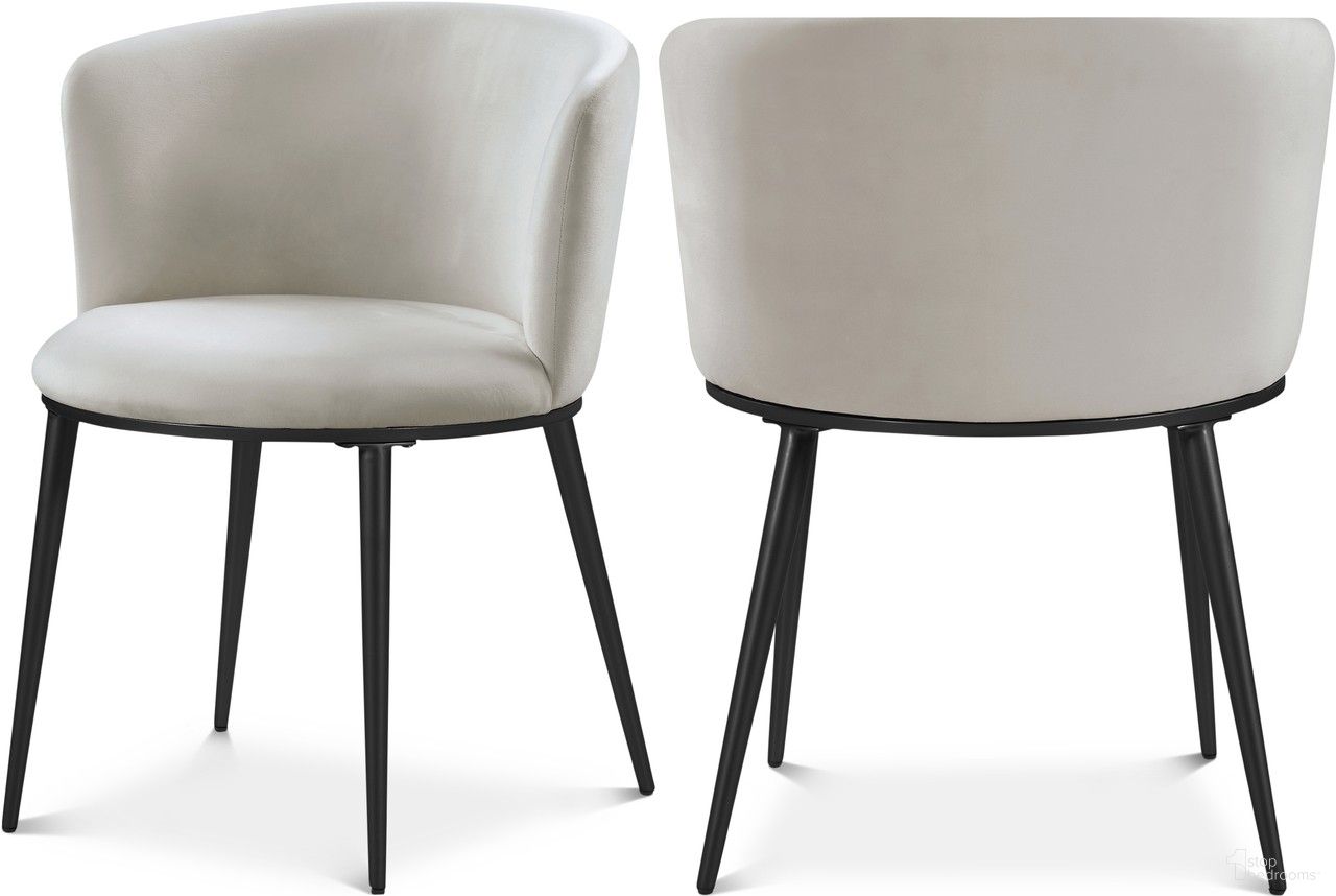 The appearance of Skylar Velvet Dining Chair Set of 2 In Cream/Matte Black designed by Meridian in the modern / contemporary interior design. This cream velvet piece of furniture was selected by 1StopBedrooms from Skylar Collection to add a touch of cosiness and style into your home. Sku: 966Cream-C. Material: Velvet. Chair Type: Side Chair.