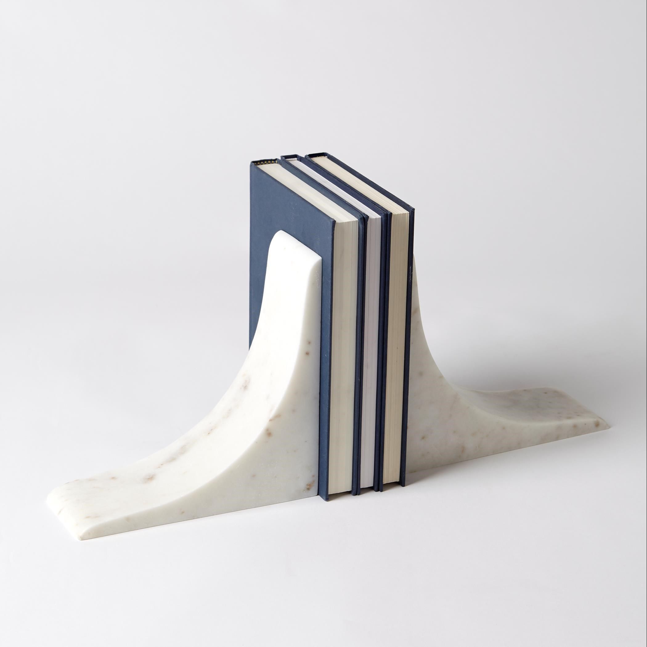 The appearance of Sleek Bookends In White designed by Global Views in the modern / contemporary interior design. This white piece of furniture  was selected by 1StopBedrooms from Sleek Collection to add a touch of cosiness and style into your home. Sku: 993045. Material: Marble.
