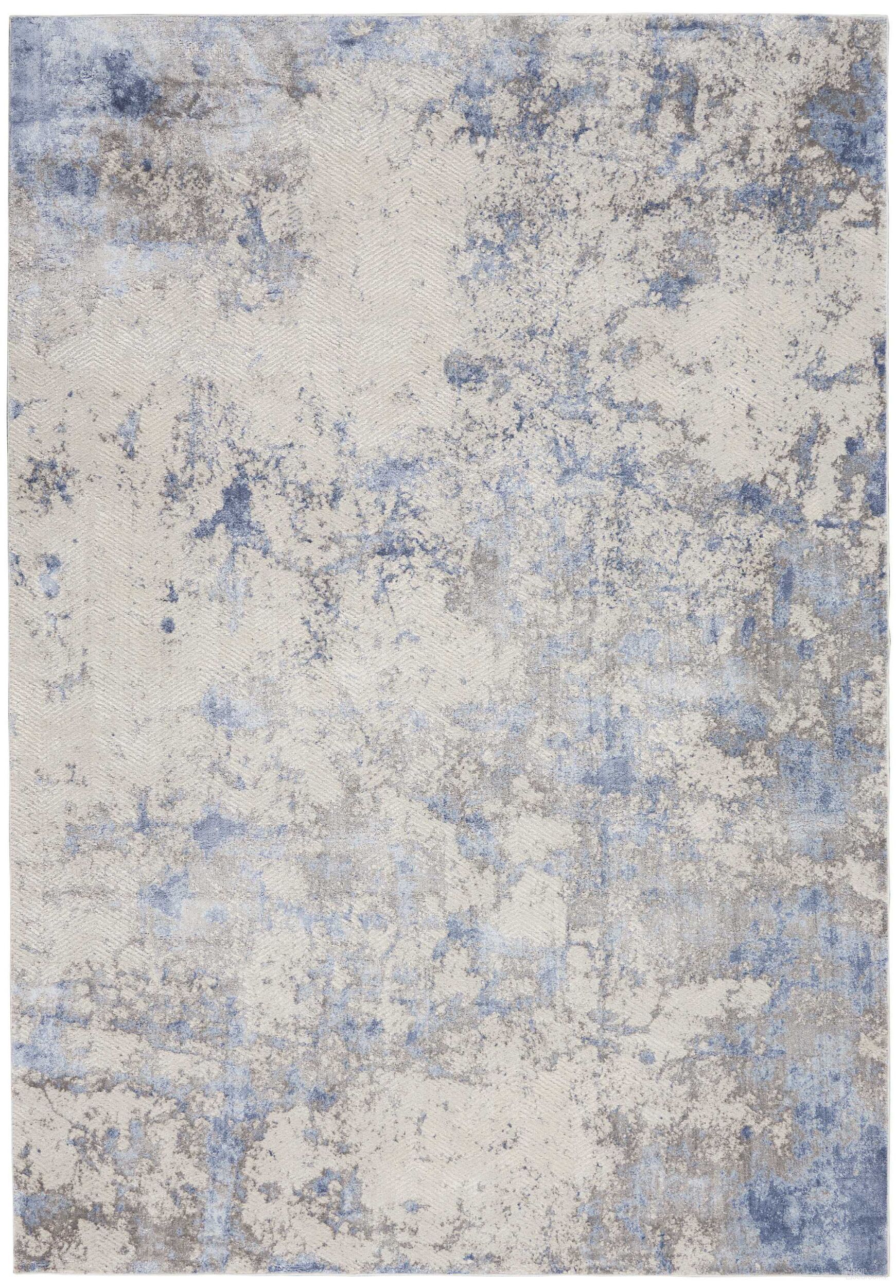 The appearance of Sleek Textures Blue and Ivory 3'11" x 5'11" Area Rug designed by Nourison in the modern / contemporary interior design. This blue and ivory piece of furniture  was selected by 1StopBedrooms from Sleek Textures Collection to add a touch of cosiness and style into your home. Sku: 99446711649. Material: Viscose.