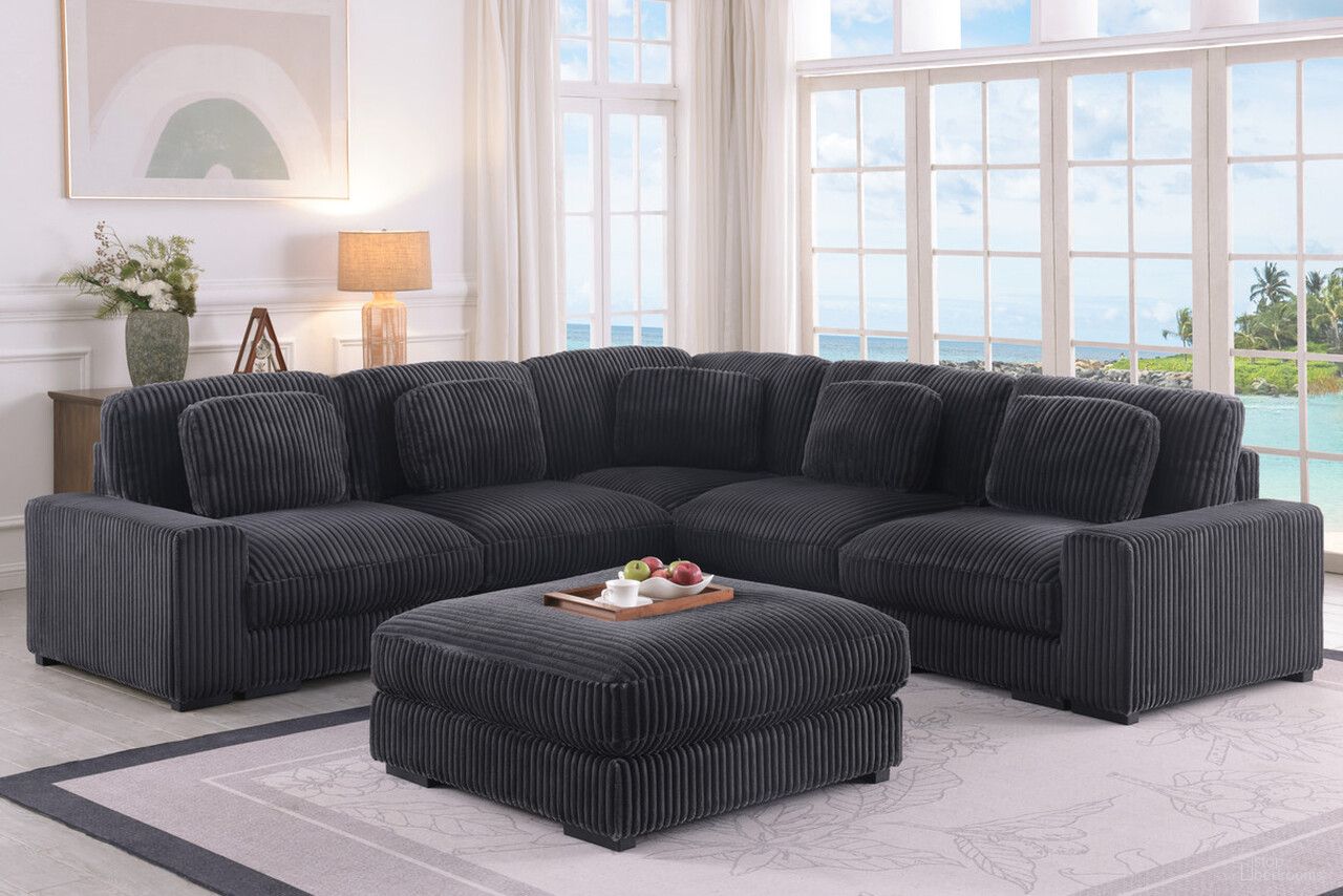 The appearance of Sloane 117 Inch Corduroy Fabric Reversible L-Shape Modular Sectional Sofa with Ottoman In Charcoal designed by Lilola Home in the modern / contemporary interior design. This charcoal piece of furniture was selected by 1StopBedrooms from Sloane Collection to add a touch of cosiness and style into your home. Sku: 81650-R;81650-RARM;81650-C;81650-A;81650-A;81650-L;81650-LARM;81650-O. Layout: L-Shape. Material: Corduroy.
