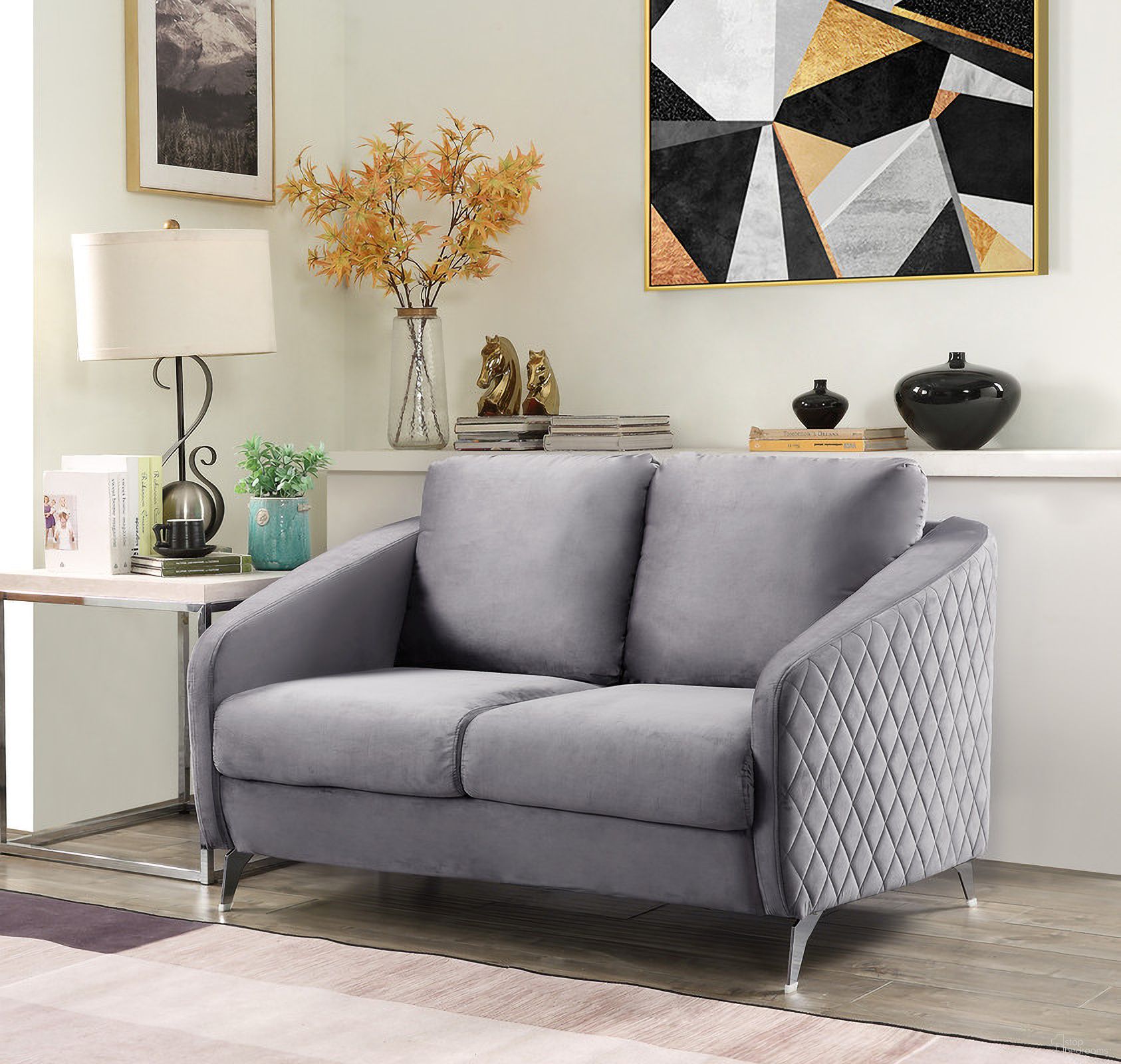 The appearance of Sofia Gray Velvet Modern Chic Loveseat Couch designed by Lilola Home in the modern / contemporary interior design. This gray piece of furniture was selected by 1StopBedrooms from Sofia Collection to add a touch of cosiness and style into your home. Sku: 89720-L. Material: Velvet.