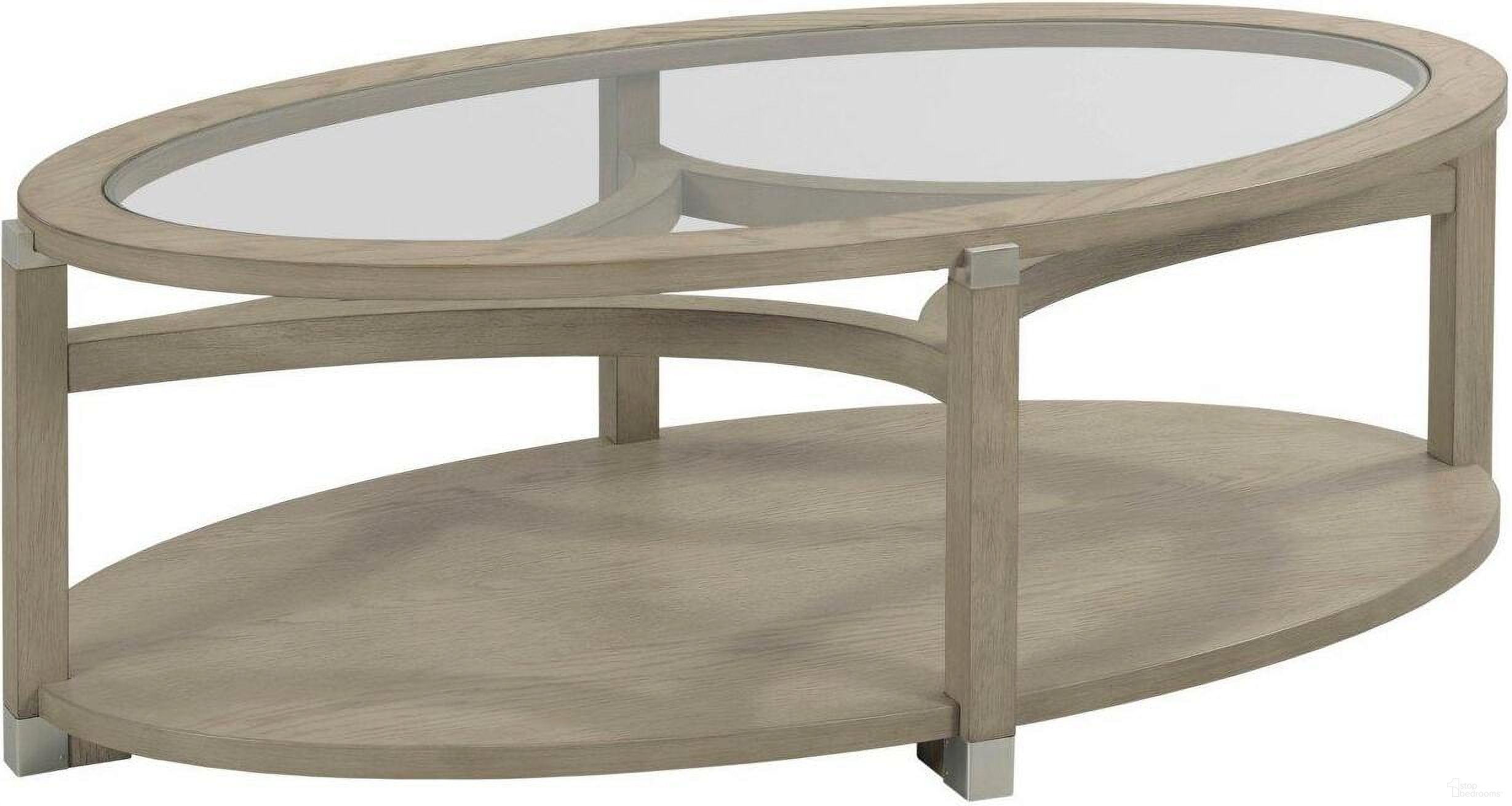 The appearance of Solstice Oval Coffee Table designed by Hammary in the modern / contemporary interior design. This light stain piece of furniture  was selected by 1StopBedrooms from Solstice Collection to add a touch of cosiness and style into your home. Sku: 086-912. Material: Wood.