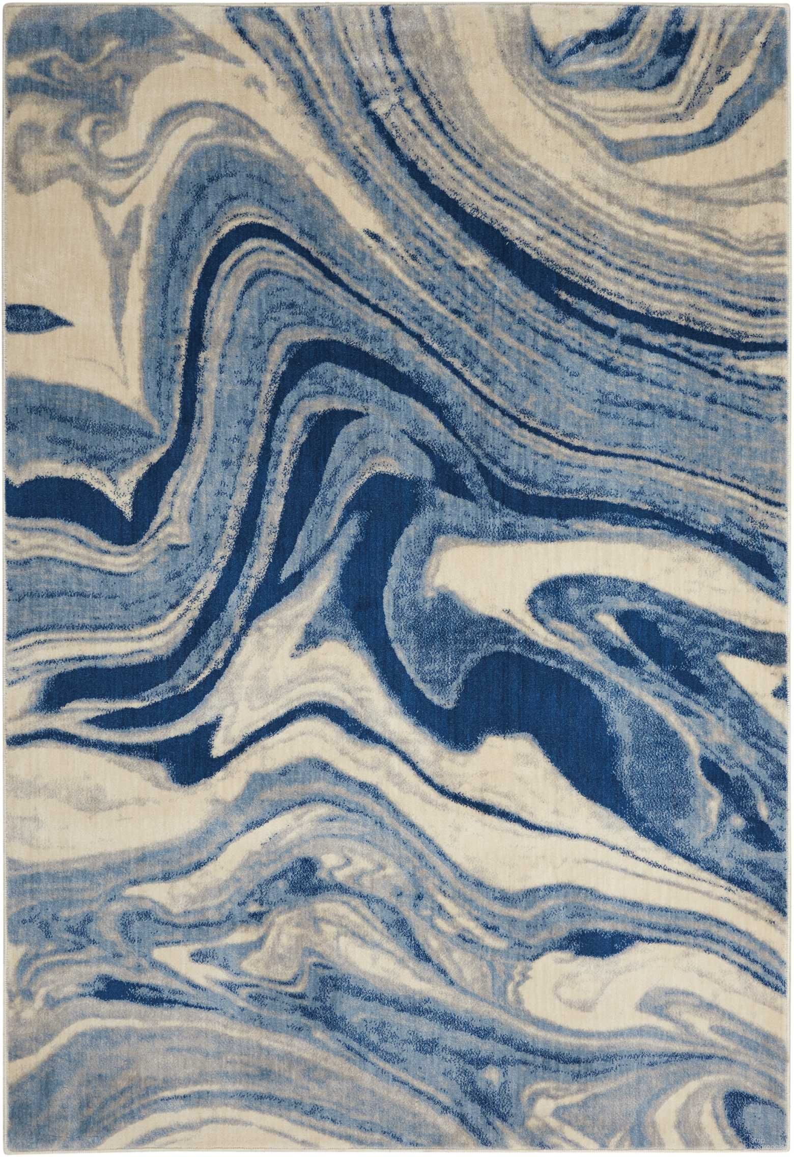 The appearance of Somerset Light Blue 3'6" x 5'6" Area Rug designed by Nourison in the modern / contemporary interior design. This light blue piece of furniture was selected by 1StopBedrooms from Somerset Collection to add a touch of cosiness and style into your home. Sku: 99446341136. Material: Polyester.