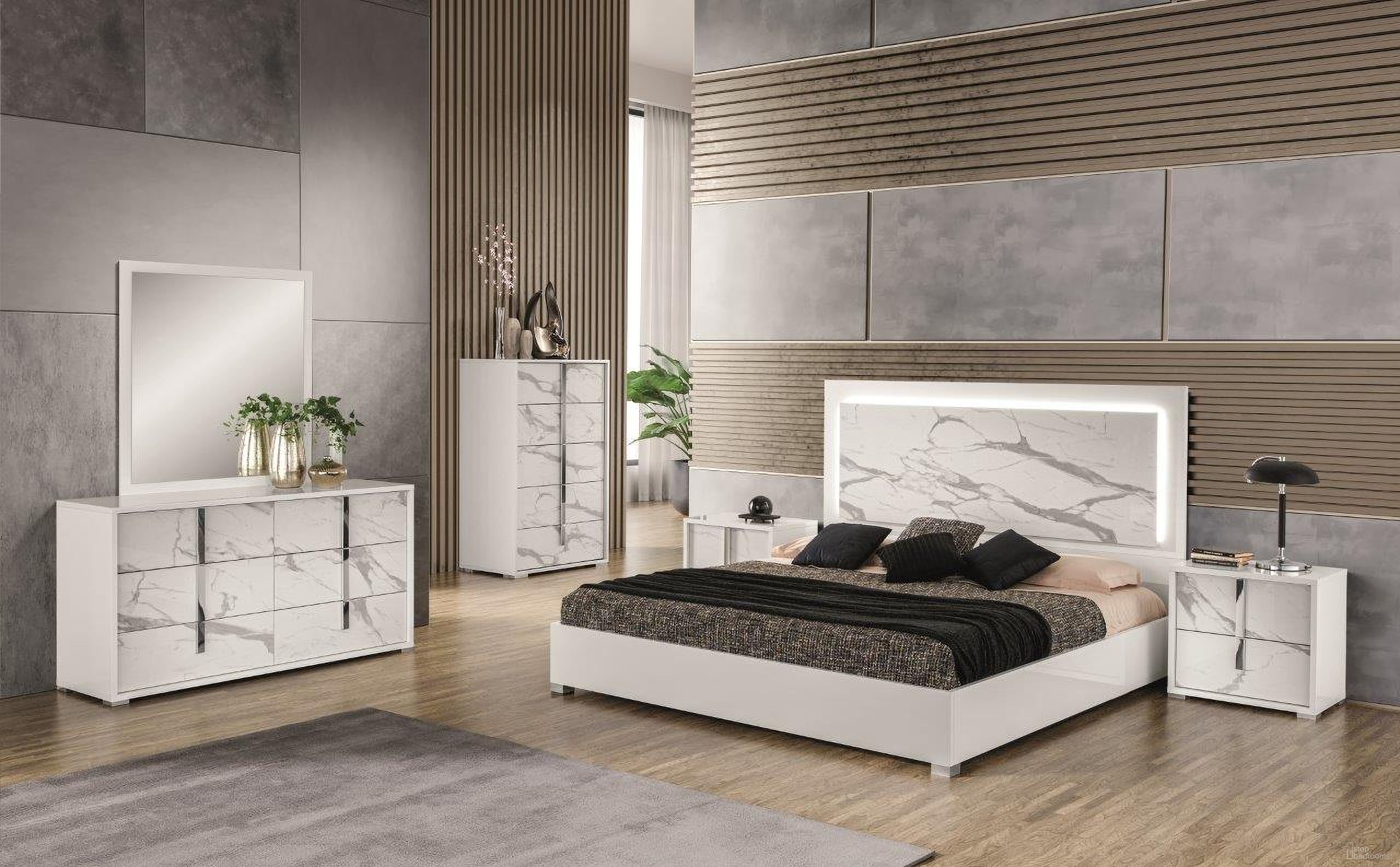 The appearance of Sonia Bedroom Set In White and Grey designed by J&M in the modern / contemporary interior design. This white and grey piece of furniture  was selected by 1StopBedrooms from Sonia Collection to add a touch of cosiness and style into your home. Sku: 19965-Q;19965-NS. Material: Faux Marble. Bed Size: Queen.