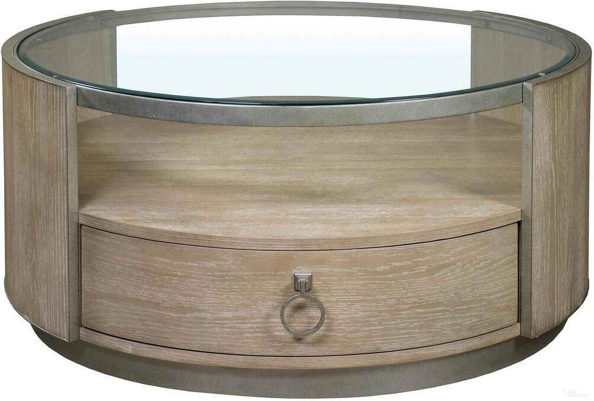 The appearance of Sophie Round Coffee Table In Natural designed by Riverside Furniture in the glam interior design. This natural piece of furniture  was selected by 1StopBedrooms from Sophie Collection to add a touch of cosiness and style into your home. Sku: 50303. Material: Wood.