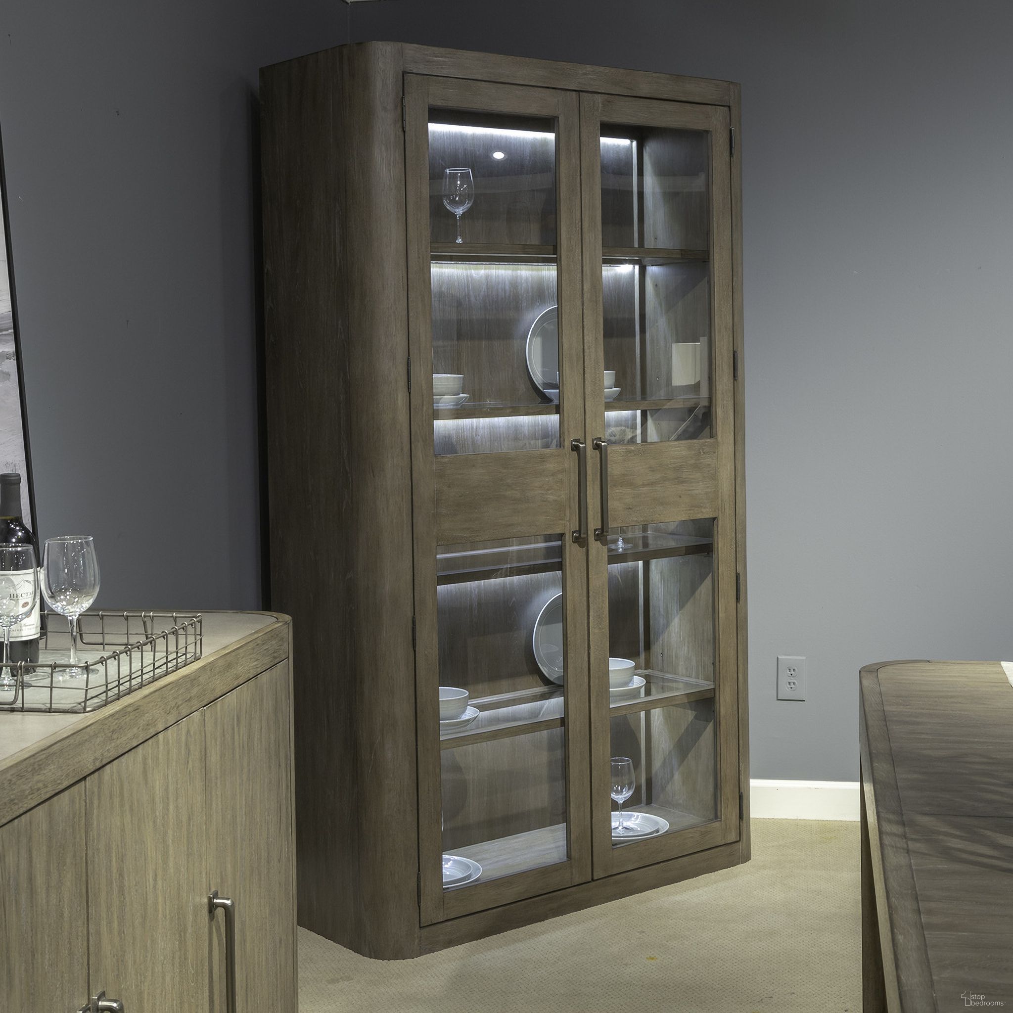 The appearance of South Bend Bunching Display Cabinet In Brown designed by Liberty in the modern / contemporary interior design. This brown piece of furniture  was selected by 1StopBedrooms from South Bend Collection to add a touch of cosiness and style into your home. Sku: 306-CH4880. Material: Solid Rubberwood.