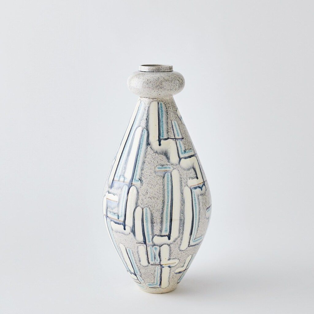 The appearance of Spindle Medium Painted Vase In Grey and Blue designed by Global Views in the modern / contemporary interior design. This grey/blue piece of furniture  was selected by 1StopBedrooms from Spindle Collection to add a touch of cosiness and style into your home. Sku: 111072. Material: Brass.