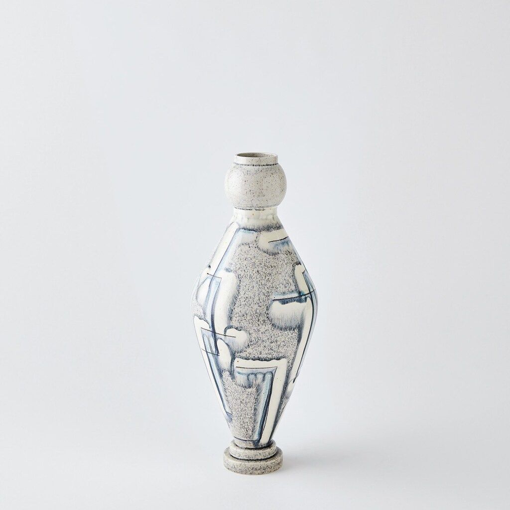The appearance of Spindle Small Vase In Grey and Blue designed by Global Views in the modern / contemporary interior design. This grey/blue piece of furniture was selected by 1StopBedrooms from Spindle Collection to add a touch of cosiness and style into your home. Sku: 111073. Material: Brass.