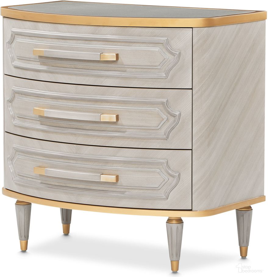The appearance of St. Charles 2-Drawer Nightstand In Dove Gray designed by Michael Amini in the transitional interior design. This dove gray piece of furniture was selected by 1StopBedrooms from St. Charles Collection to add a touch of cosiness and style into your home. Sku: 9088042-803. Material: Poplar Solid.
