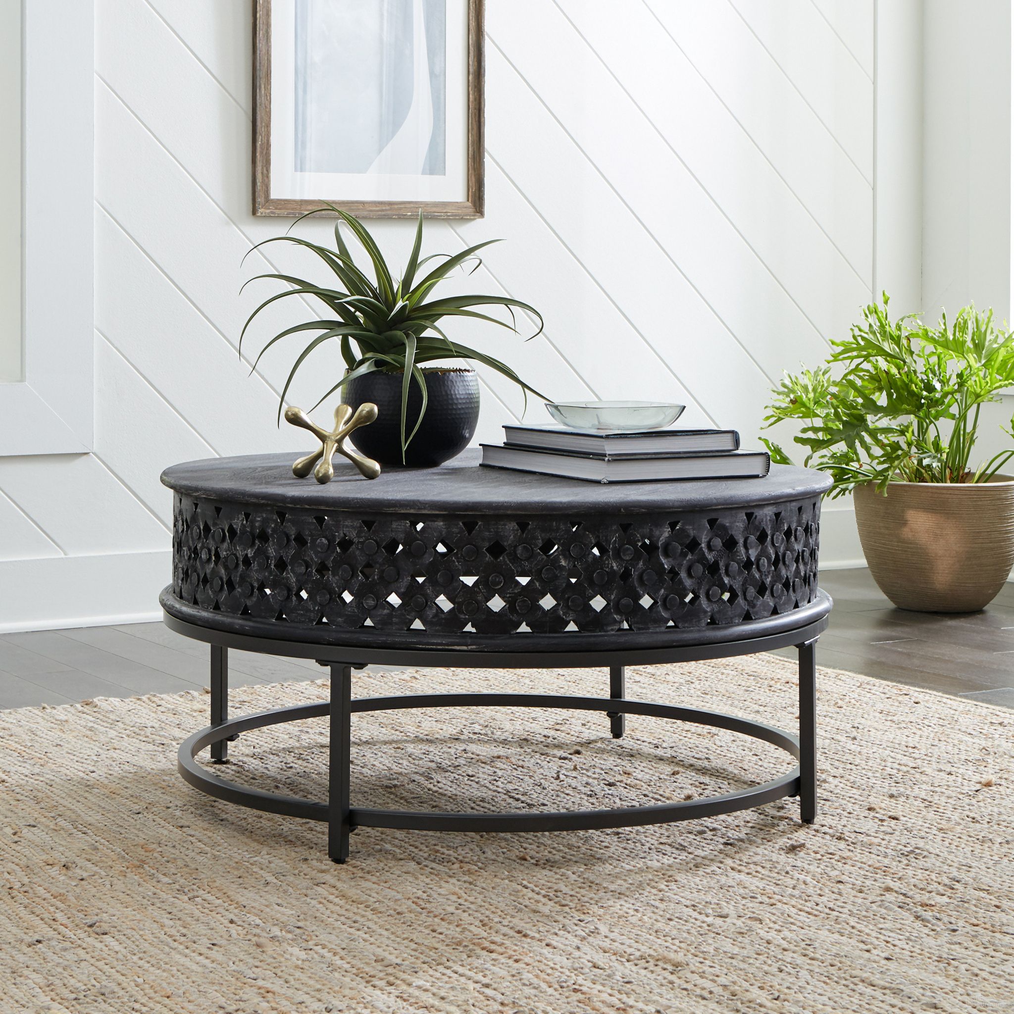 The appearance of Stella Accent Cocktail Table In Black designed by Liberty in the bohemian interior design. This black piece of furniture was selected by 1StopBedrooms from Stella Collection to add a touch of cosiness and style into your home. Sku: 2134-AT1000. Material: Wood.