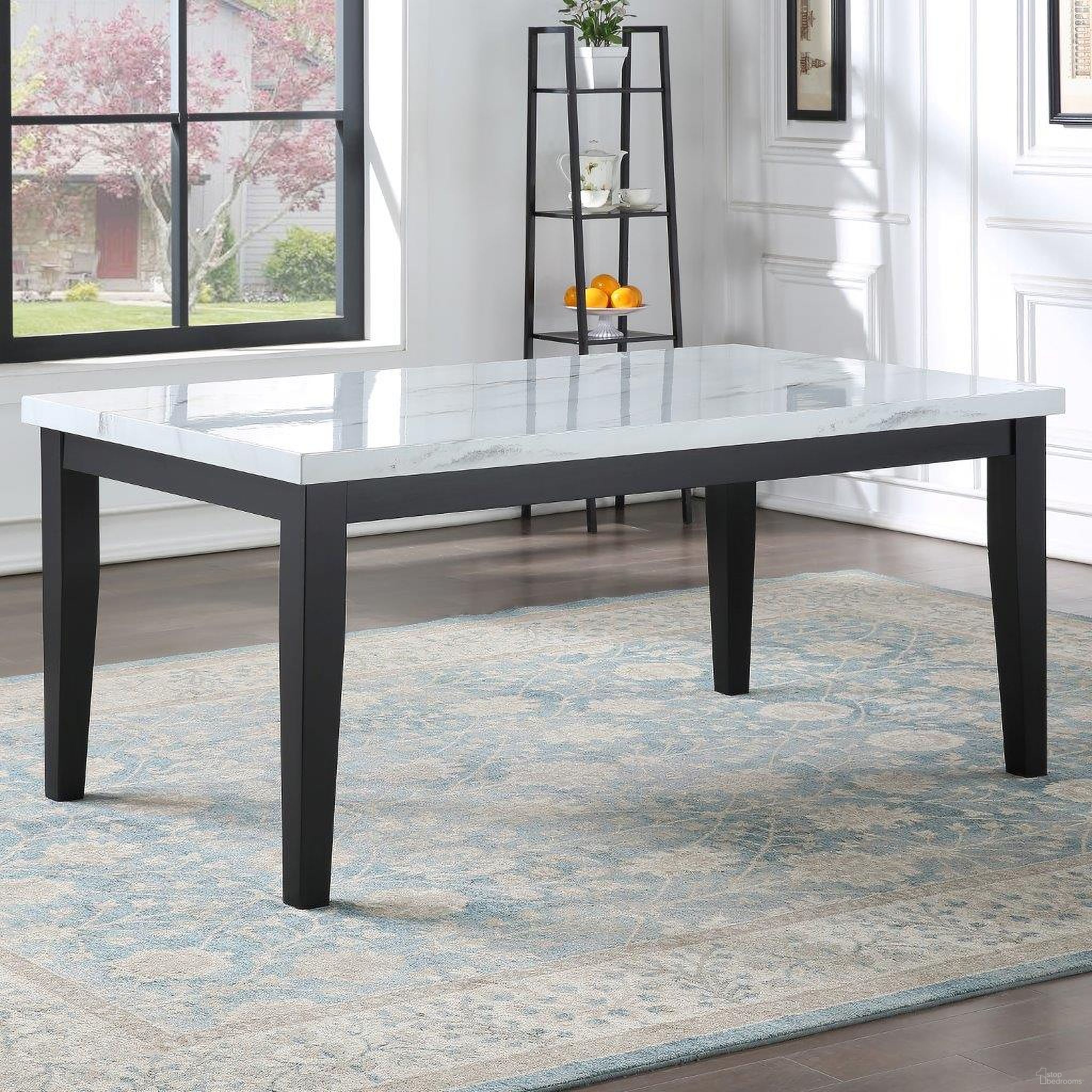 The appearance of Sterling Faux Marble Top Dining Table In Black designed by Steve Silver in the modern / contemporary interior design. This black piece of furniture  was selected by 1StopBedrooms from Sterling Collection to add a touch of cosiness and style into your home. Sku: SN500T. Table Base Style: Legs. Material: MDF. Table Top Shape: Rectangular. Size: 38" x 66".