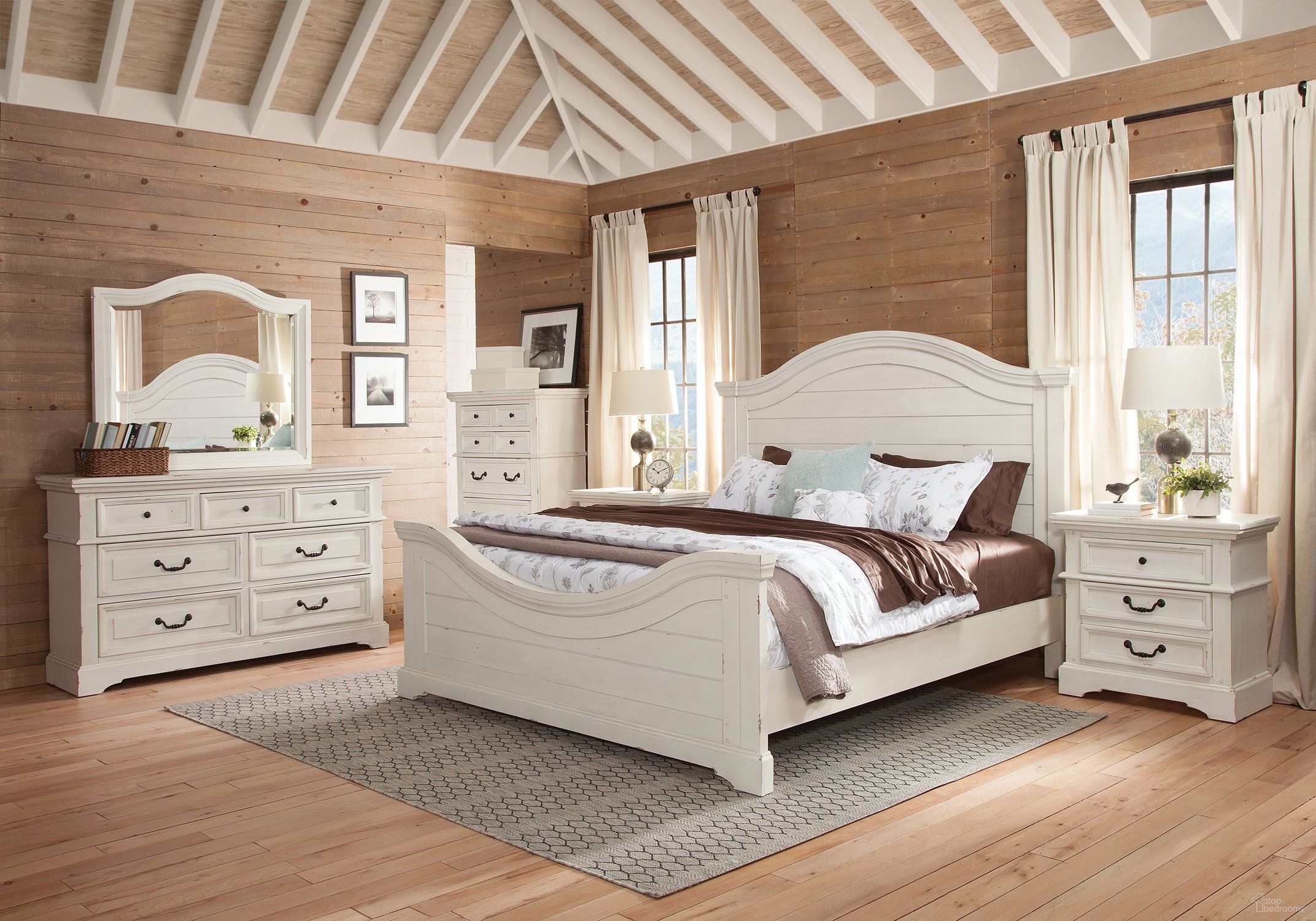 The appearance of Stonebrook Panel Bedroom Set In Antique White designed by American Woodcrafters in the transitional interior design. This antique white piece of furniture  was selected by 1StopBedrooms from Stonebrook Collection to add a touch of cosiness and style into your home. Sku: 7810-950;7810-952;7810-880;7810-430. Bed Type: Panel Bed. Bed Size: Queen. Material: Rubberwood.
