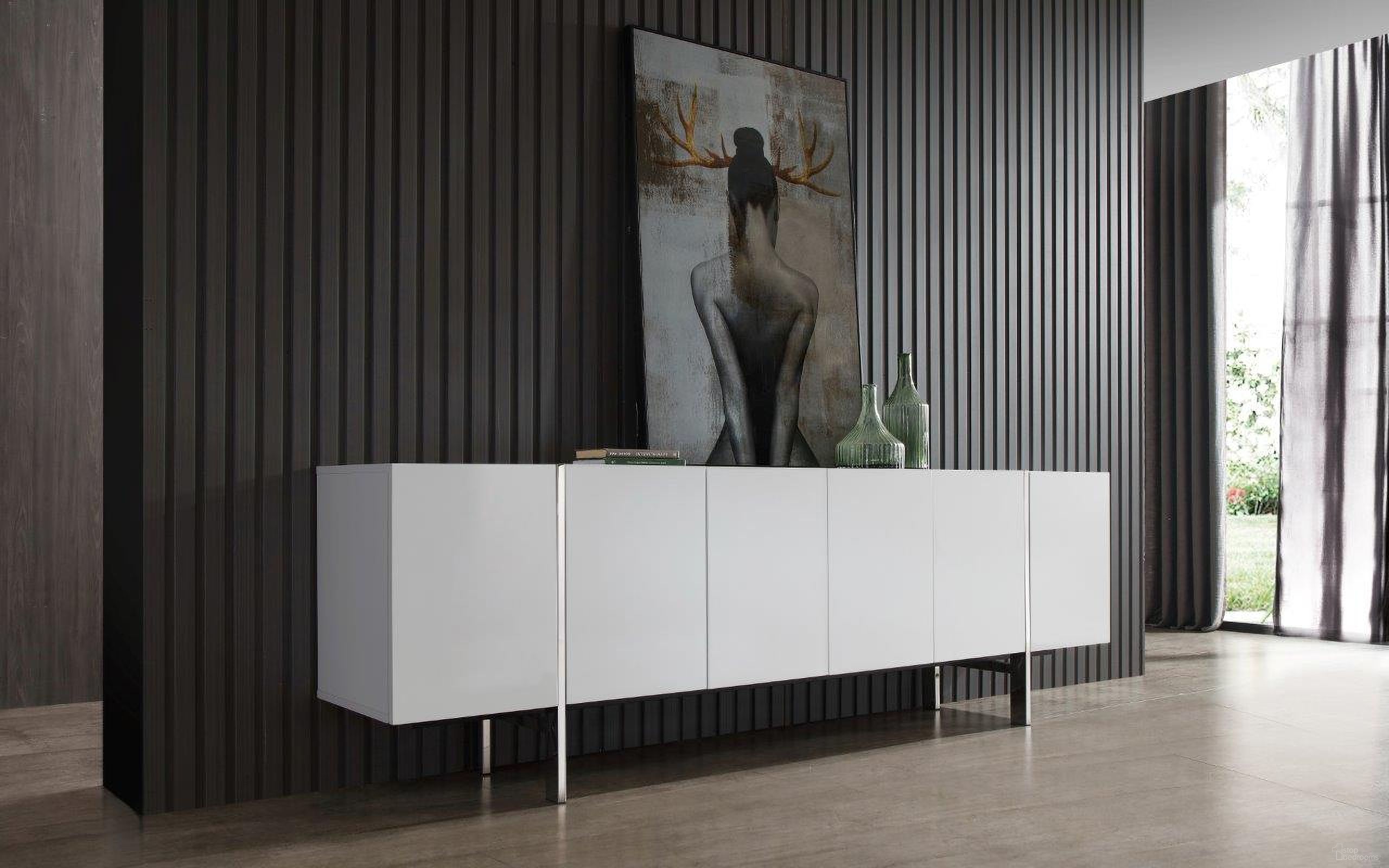 The appearance of Struttura White Large Buffet designed by Whiteline Modern Living in the modern / contemporary interior design. This white piece of furniture  was selected by 1StopBedrooms from Struttura Collection to add a touch of cosiness and style into your home. Sku: SB1249L-WHT. Material: Stainless Steel.