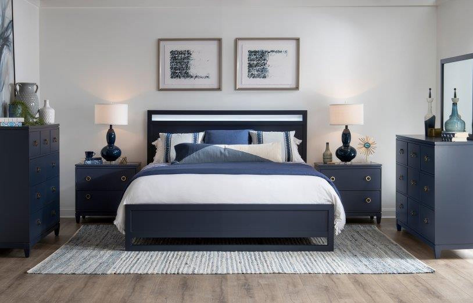 The appearance of Summerland Inkwell Blue Panel Bedroom Set designed by Legacy Classic in the modern / contemporary interior design. This blue piece of furniture was selected by 1StopBedrooms from Summerland Collection to add a touch of cosiness and style into your home. Sku: 1162-4105;1162-4115;1162-4901;1162-3101. Bed Type: Panel Bed. Bed Size: Queen. Material: Poplar.