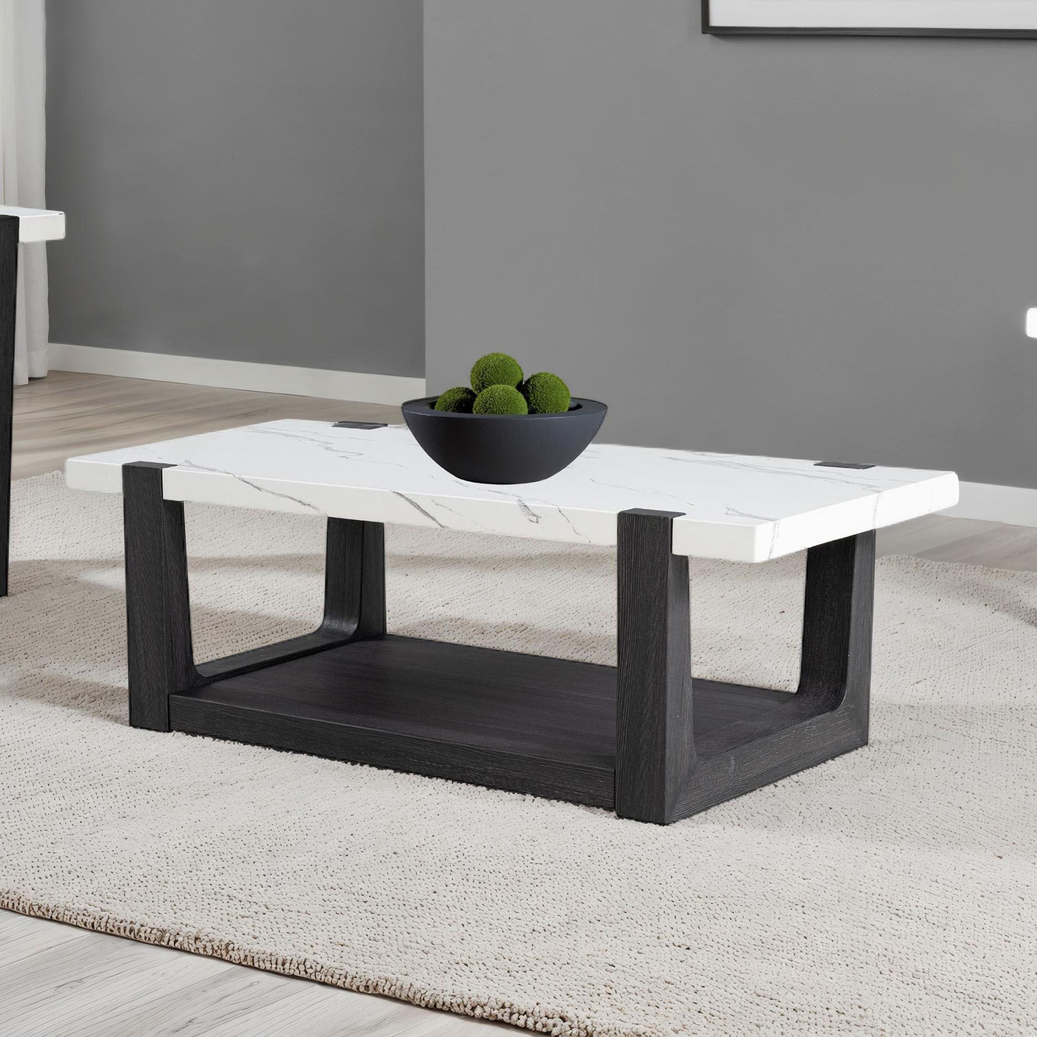 The appearance of Sundbry Coffee Table In White and Black designed by Furniture of America in the modern / contemporary interior design. This white/black piece of furniture  was selected by 1StopBedrooms from Sundbry Collection to add a touch of cosiness and style into your home. Sku: FM44010BK-C. Material: MDF.