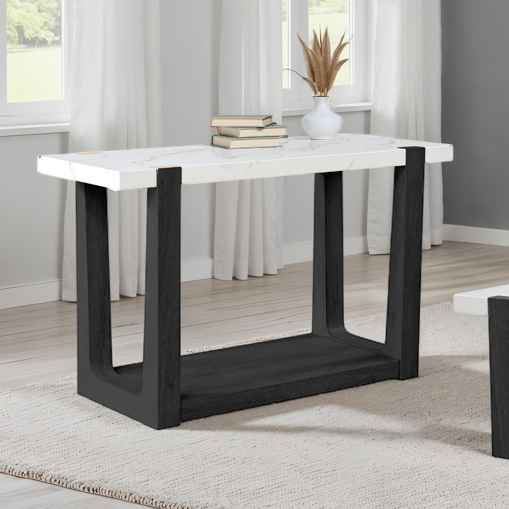 The appearance of Sundbry Sofa Table In White and Black designed by Furniture of America in the modern / contemporary interior design. This white/black piece of furniture  was selected by 1StopBedrooms from Sundbry Collection to add a touch of cosiness and style into your home. Sku: FM44010BK-S. Material: MDF.