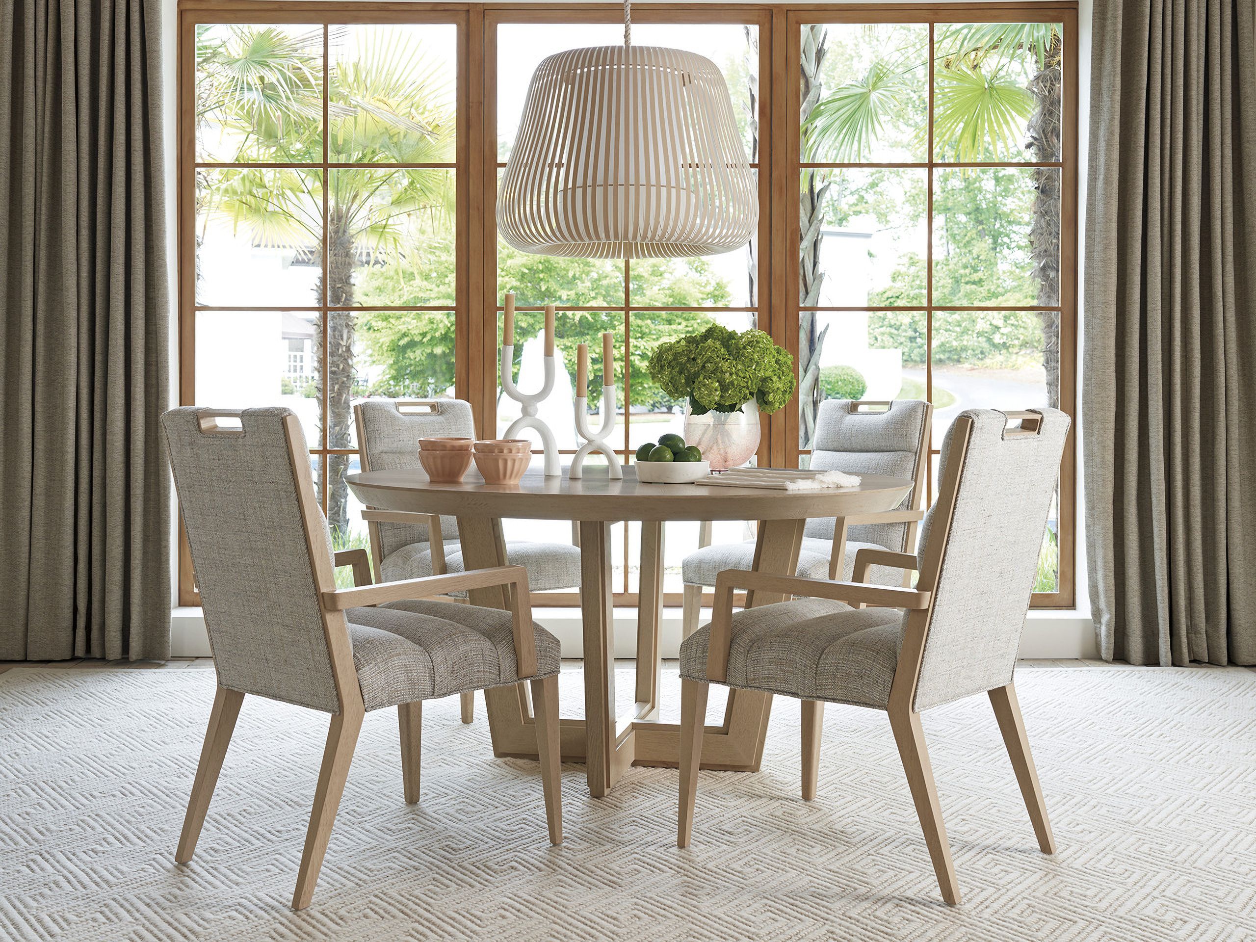 The appearance of Sunset Key Hanson Round Dining Set In Sand Drift designed by Tommy Bahama in the modern / contemporary interior design. This sand drift piece of furniture was selected by 1StopBedrooms from Sunset Key Collection to add a touch of cosiness and style into your home. Sku: 578-875C;578-883-01. Table Base Style: Pedestal. Table Top Shape: Round. Material: Wood. Size: 58".