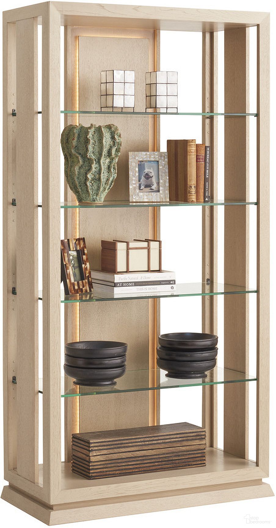 The appearance of Sunset Key Lancaster Bookcase In Sand Drift designed by Tommy Bahama in the modern / contemporary interior design. This sand drift piece of furniture  was selected by 1StopBedrooms from Sunset Key Collection to add a touch of cosiness and style into your home. Sku: 578-991. Material: Wood.