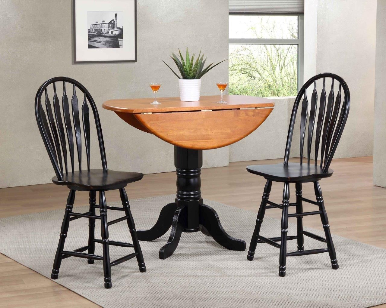 The appearance of Sunset Trading 3 Piece Drop Leaf Pub Table Set with 24 Inch Swivel Barstools designed by Sunset Trading in the modern / contemporary interior design. This antique black and cherry piece of furniture was selected by 1StopBedrooms from Black Cherry Selections Collection to add a touch of cosiness and style into your home. Sku: DLU-TPD-4242-BCH-T;DLU-TPD-4242-BCH-CB;DLU-B24-AB;DLU-B24-AB. Material: Wood.