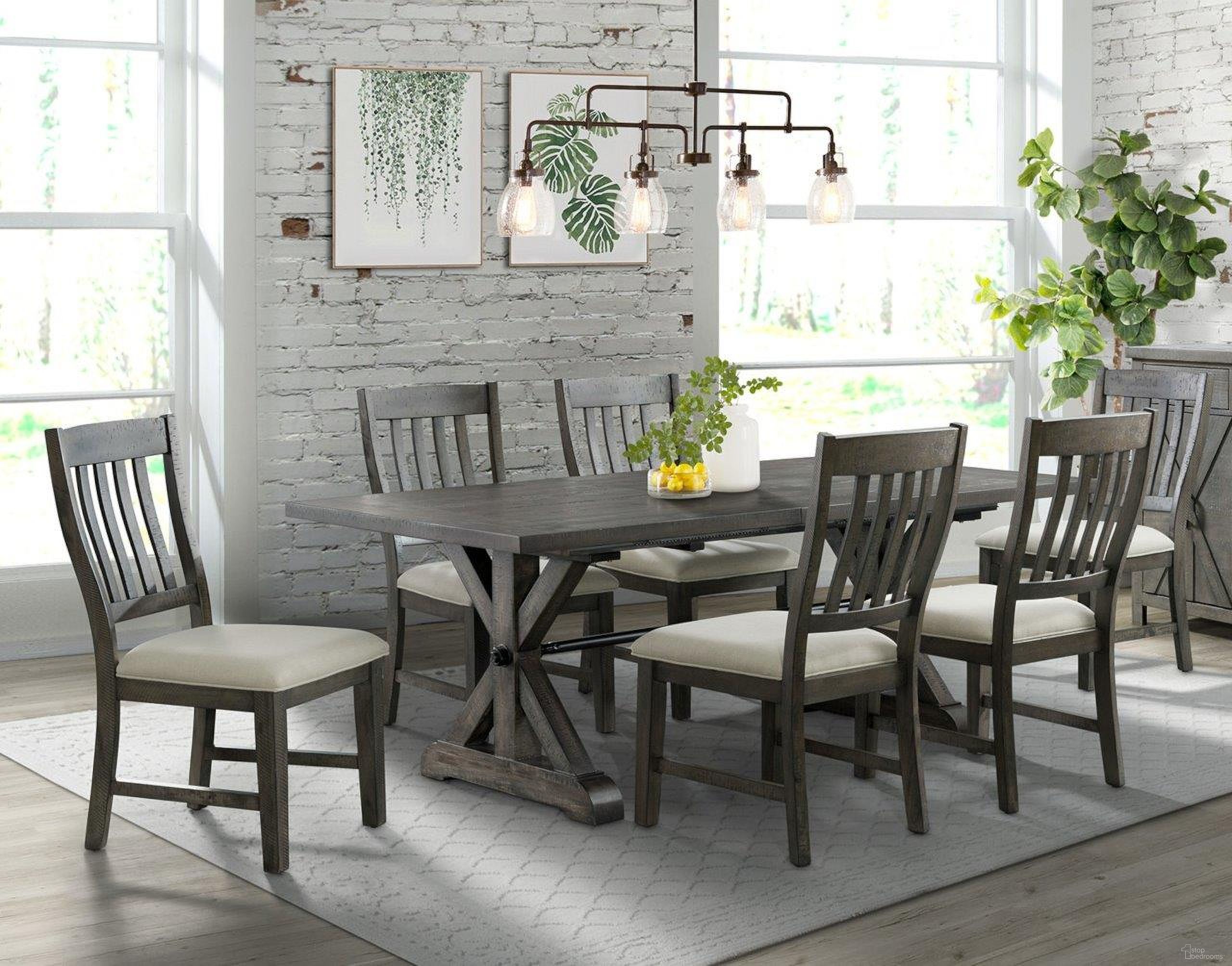 The appearance of Sunset Trading Trestle 7 Piece Dining Set 96 Inch Rectangular Extendable Table 6 Upholstered Side Chairs Distressed Gray Wood Seats 8 designed by Sunset Trading in the modern / contemporary interior design. This gray piece of furniture  was selected by 1StopBedrooms from Trestle Collection to add a touch of cosiness and style into your home. Sku: ED-SK100T;ED-SK100B;ED-SK170SC-RTA;ED-SK170SC-RTA;ED-SK170SC-RTA. Material: Wood.