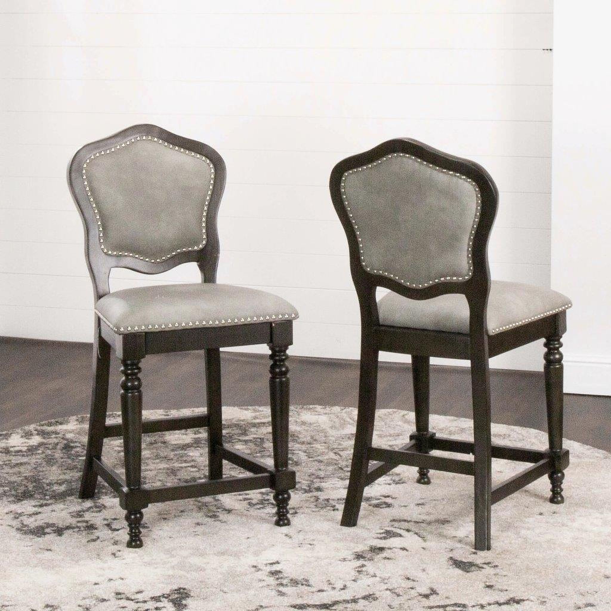 The appearance of Sunset Trading Vegas Upholstered Barstools With Backs Counter Height Dining Chairs Distressed Gray Wood Nailheads Set Of 2 designed by Sunset Trading in the transitional interior design. This distressed grey piece of furniture was selected by 1StopBedrooms from Vegas Collection to add a touch of cosiness and style into your home. Sku: CR-87711-24-RTA. Material: Wood.