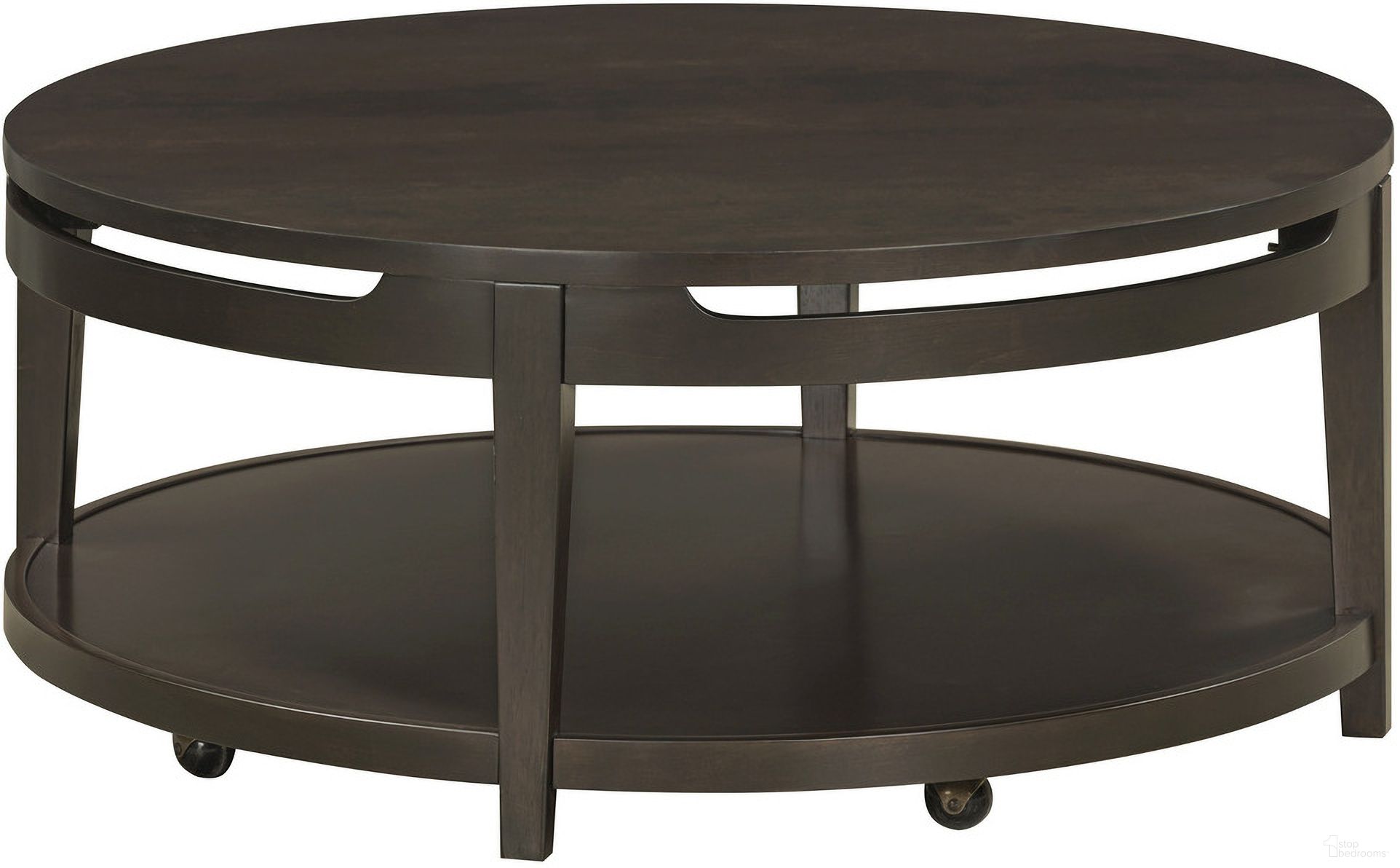 The appearance of Sutton Round Cocktail Table In French Roast designed by Aspenhome in the transitional interior design. This roast piece of furniture was selected by 1StopBedrooms from Sutton Collection to add a touch of cosiness and style into your home. Sku: I3048-9101. Material: Wood.