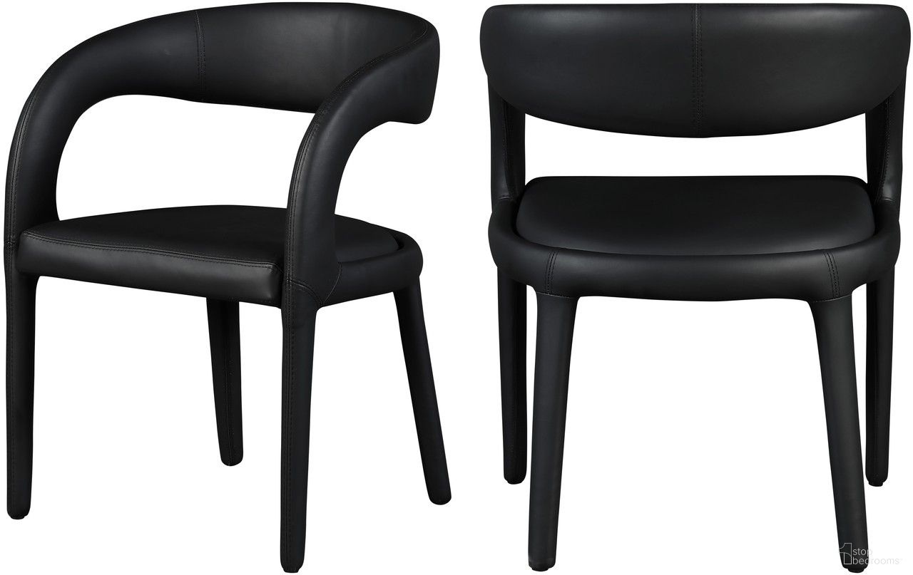 The appearance of Sylvester Vegan Leather Dining Chair In Black designed by Meridian in the modern / contemporary interior design. This black piece of furniture was selected by 1StopBedrooms from Sylvester Collection to add a touch of cosiness and style into your home. Sku: 987Black-C. Material: Wood. Chair Type: Arm Chair.