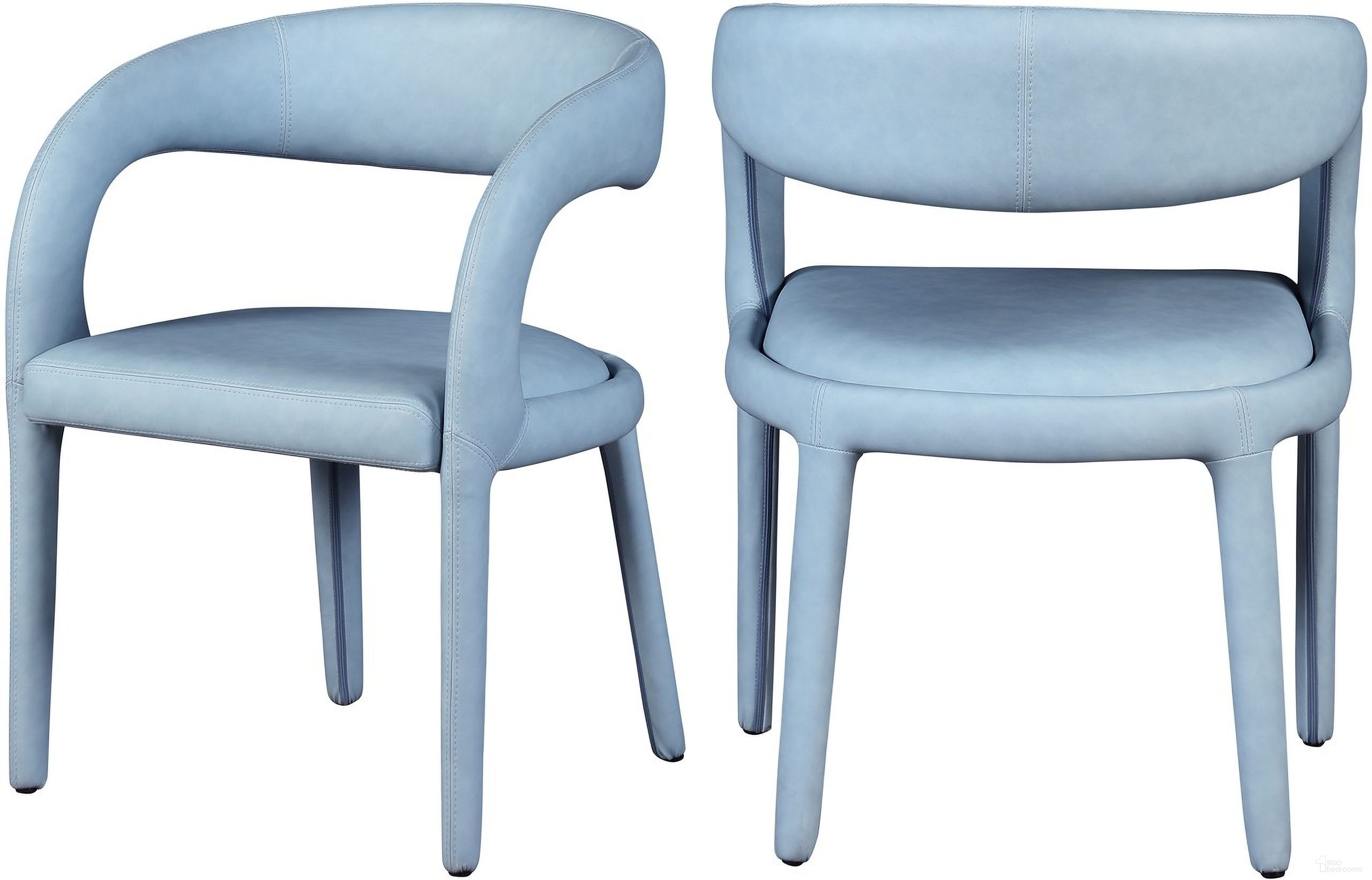 The appearance of Sylvester Vegan Leather Dining Chair In Light Blue designed by Meridian in the modern / contemporary interior design. This light blue piece of furniture was selected by 1StopBedrooms from Sylvester Collection to add a touch of cosiness and style into your home. Sku: 987LtBlu-C. Material: Wood. Chair Type: Arm Chair.