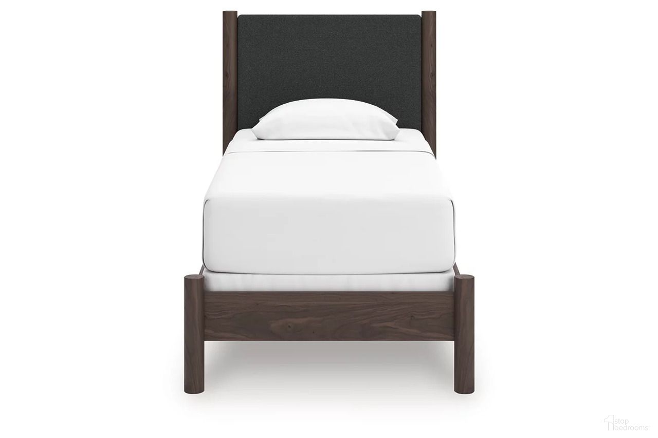 The appearance of Symarro Twin Upholstered Panel Bed In Brown designed by Signature Design by Ashley in the modern / contemporary interior design. This brown piece of furniture  was selected by 1StopBedrooms from Symarro Collection to add a touch of cosiness and style into your home. Sku: NCB2614-152;NCB2614-53. Bed Type: Panel Bed. Bed Size: Twin.