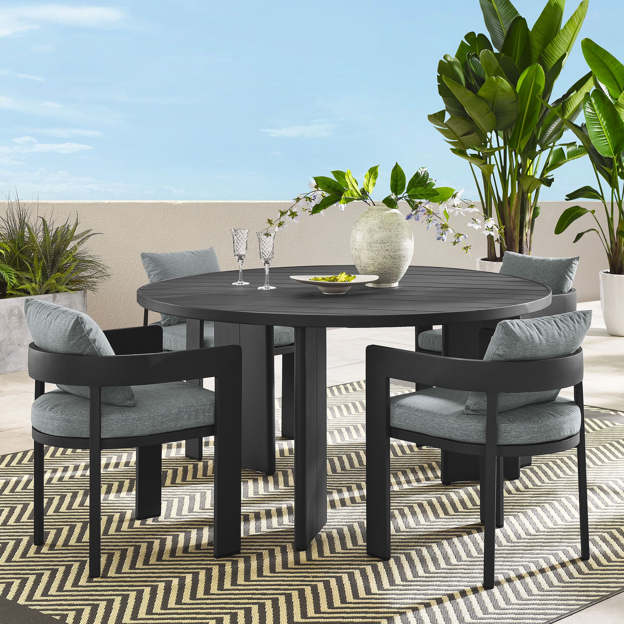 The appearance of Tahoe 5-Piece Outdoor Patio Aluminum Dining Set In Gray designed by Modway in the modern / contemporary interior design. This gray piece of furniture was selected by 1StopBedrooms from Tahoe Collection to add a touch of cosiness and style into your home. Sku: EEI-7053-GRY-GRY;EEI-7055-GRY-BASE;EEI-7055-GRY-TOP;EEI-7053-GRY-GRY;EEI-7053-GRY-GRY;EEI-7053-GRY-GRY. Material: Aluminum.