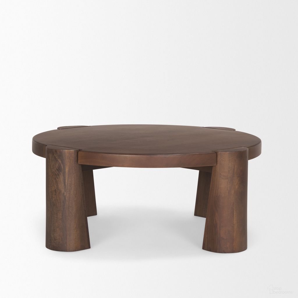 The appearance of Tammar Round Wood with Tapered Legs Coffee Table In Brown designed by Mercana in the modern / contemporary interior design. This brown piece of furniture  was selected by 1StopBedrooms from Tammar Collection to add a touch of cosiness and style into your home. Sku: 70842-AB. Material: Solid Wood.