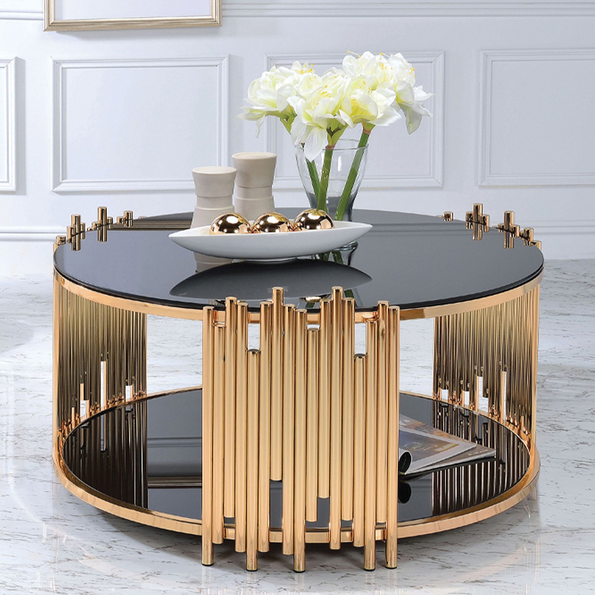 The appearance of Tanquin Gold and Black Glass Coffee Table designed by ACME in the modern / contemporary interior design. This gold piece of furniture was selected by 1StopBedrooms from Tanquin Collection to add a touch of cosiness and style into your home. Sku: 84490ST;84491GL. Material: Glass.