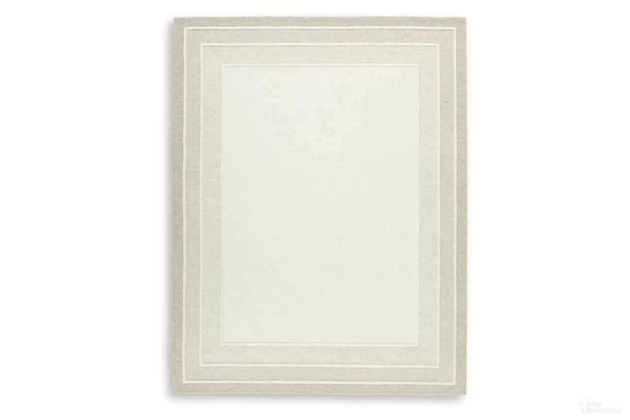 The appearance of Teelgan Large Rug In Ivory and Tan designed by Signature Design by Ashley in the transitional interior design. This ivory and tan piece of furniture was selected by 1StopBedrooms from Teelgan Collection to add a touch of cosiness and style into your home. Sku: R407311. Material: Fabric.