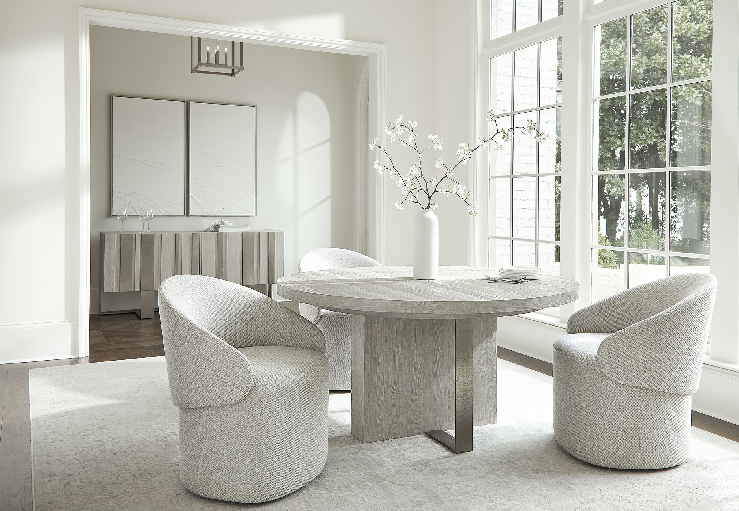 The appearance of Tempo Round Dining Room Set In Beige designed by Bernhardt in the modern / contemporary interior design. This beige piece of furniture was selected by 1StopBedrooms from Tempo Collection to add a touch of cosiness and style into your home. Sku: 346274;346275;346548. Table Top Shape: Round. Material: Metal. Size: 60".