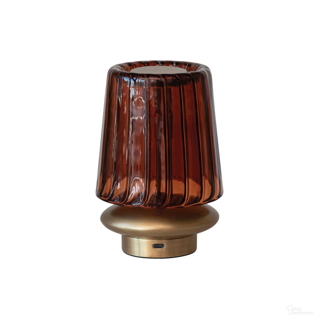 The appearance of Thalia Glass and Metal LED Table Lamp with Touch Sensor In Amber designed by Rowena Interiors in the rustic / southwestern interior design. This amber piece of furniture was selected by 1StopBedrooms from Thalia Collection to add a touch of cosiness and style into your home. Sku: DF9061. Material: Steel.