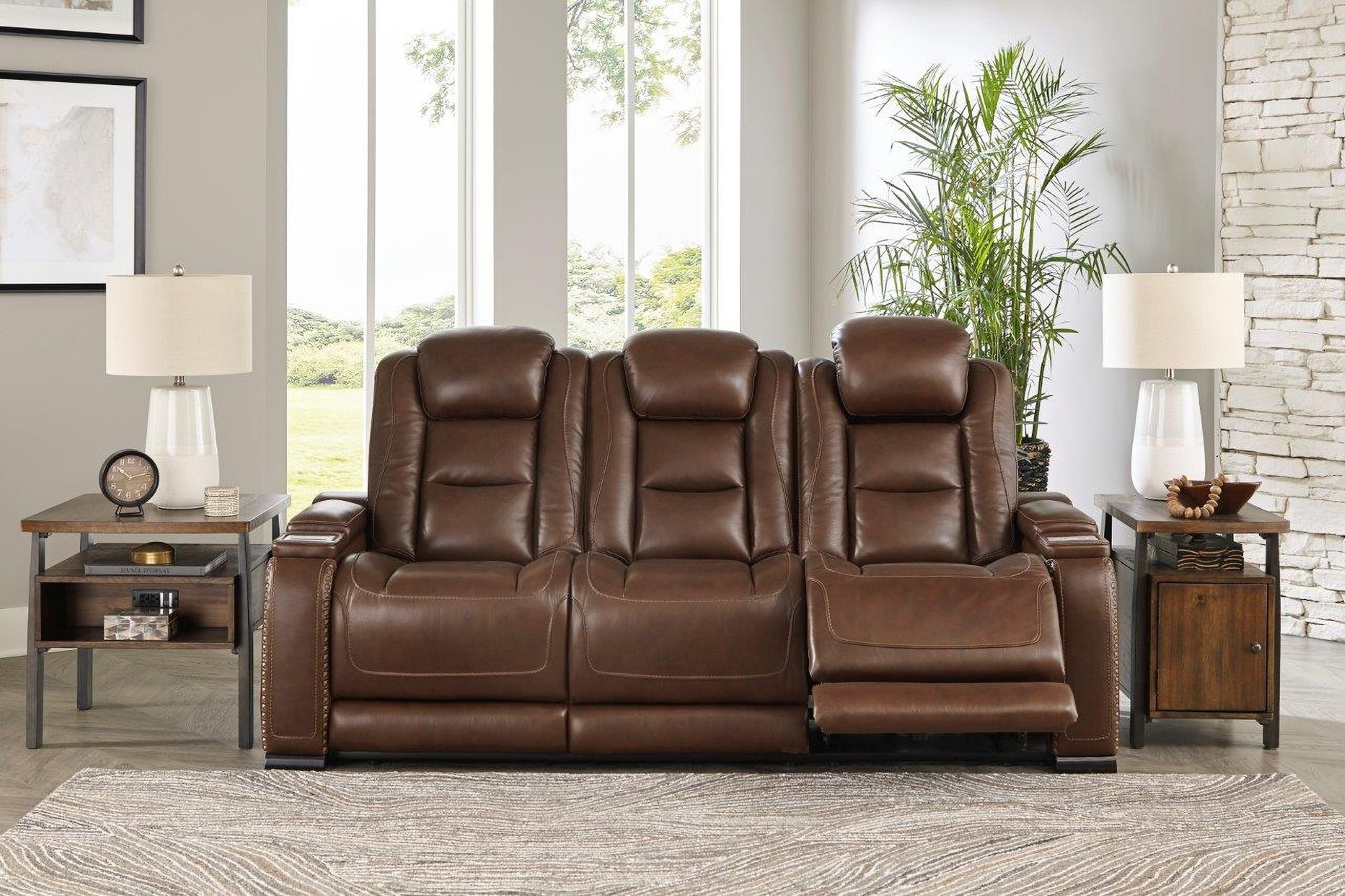 https://cdn.1stopbedrooms.com/media/i/raw/catalog/product/t/h/the-man-den-power-reclining-sofa-with-adjustable-headrest-in-mahogany_qb13309796_107.jpg
