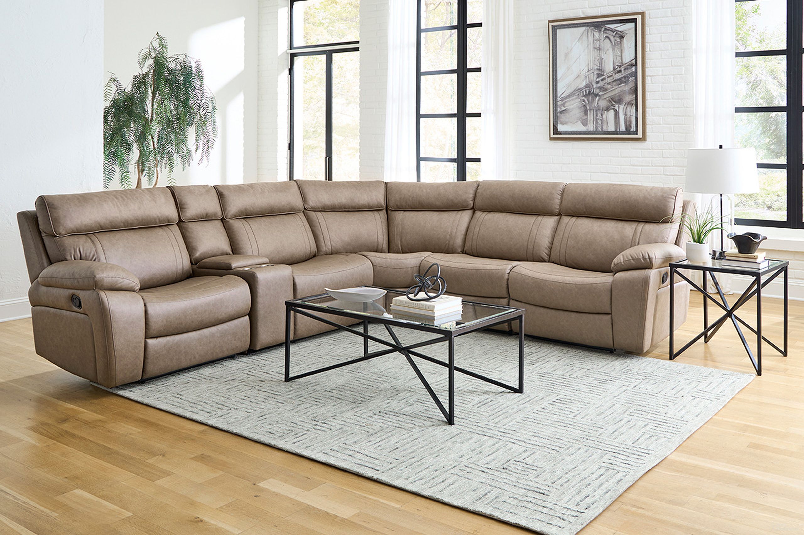 The appearance of Theon 6 Piece Modular Manual Reclining Sectional and Entertainment Console In Stokes Toffee designed by Parker House in the transitional interior design. This stokes toffee piece of furniture was selected by 1StopBedrooms from Theon Collection to add a touch of cosiness and style into your home. Sku: MTH-810-STOF;MTH-811L-STOF;MTH-811R-STOF;MTH-840-STOF;MTH-850-STOF;MTH-860-STOF. Material: Leather. Layout: L-Shape.