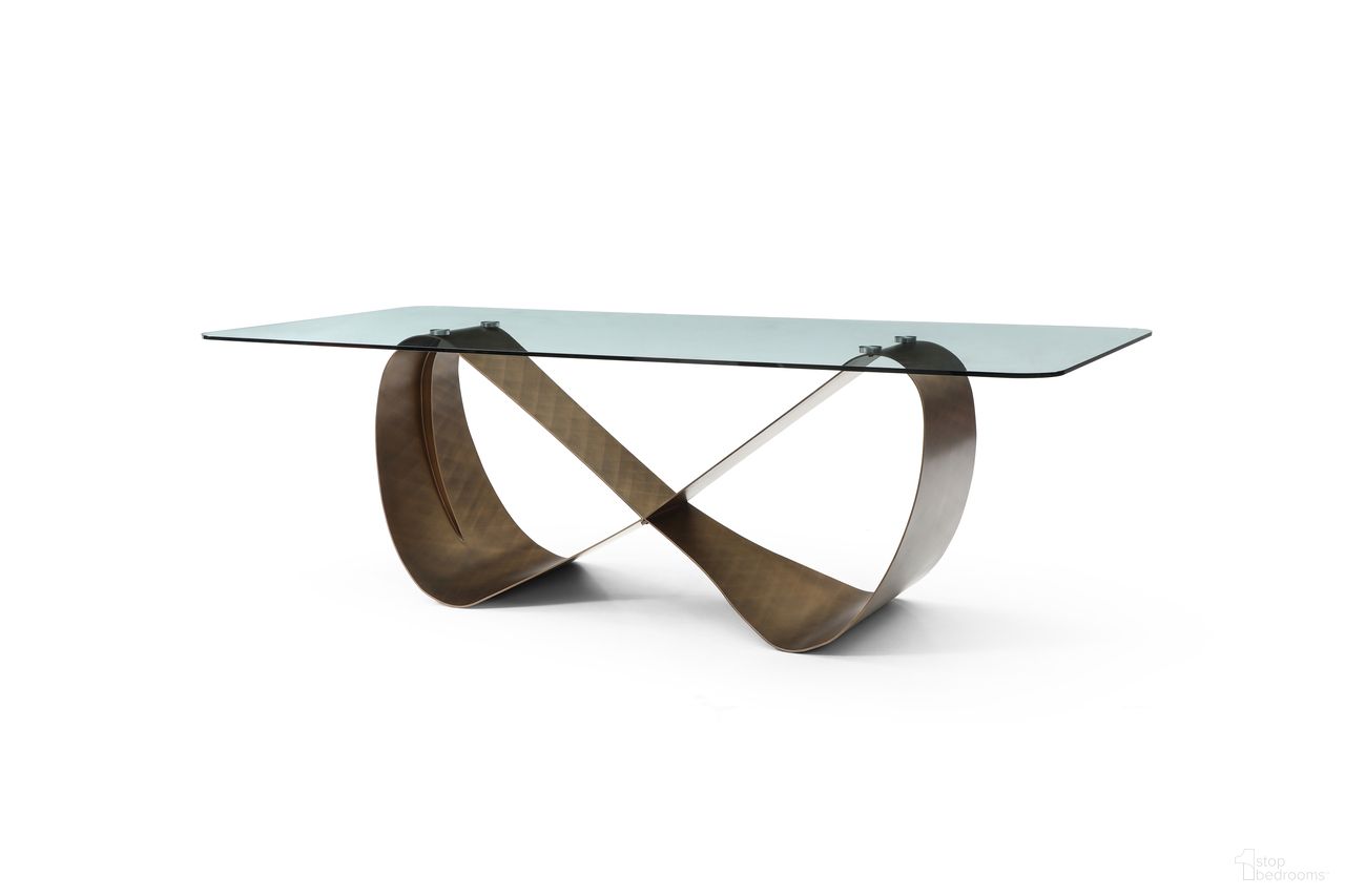 The appearance of Tiffany Glass Top Dining Table In Bronze designed by Whiteline Modern Living in the modern / contemporary interior design. This bronze piece of furniture  was selected by 1StopBedrooms from Tiffany Collection to add a touch of cosiness and style into your home. Sku: DT1928-BRZ. Table Base Style: Double Pedestal. Table Top Shape: Rectangular. Size: 43" x 94".
