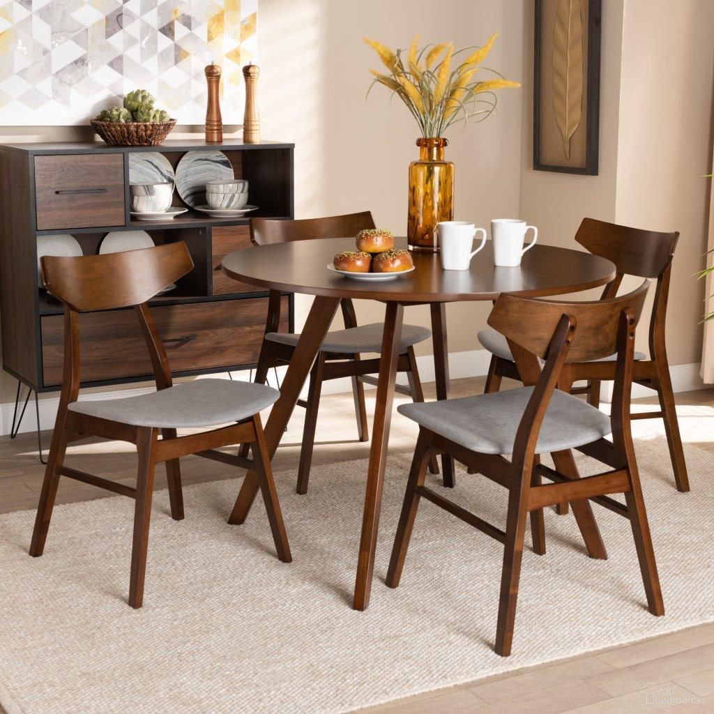 The appearance of Timothy Mid-Century Modern Transitional Light Grey Fabric Upholstered and Walnut Brown Finished Wood 5-Piece Dining Set designed by Baxton Studio in the transitional interior design. This walnut brown piece of furniture was selected by 1StopBedrooms from Timothy Collection to add a touch of cosiness and style into your home. Sku: Danica/Hexa-Smoke/Walnut-5PC Dining Set. Material: Polyester.